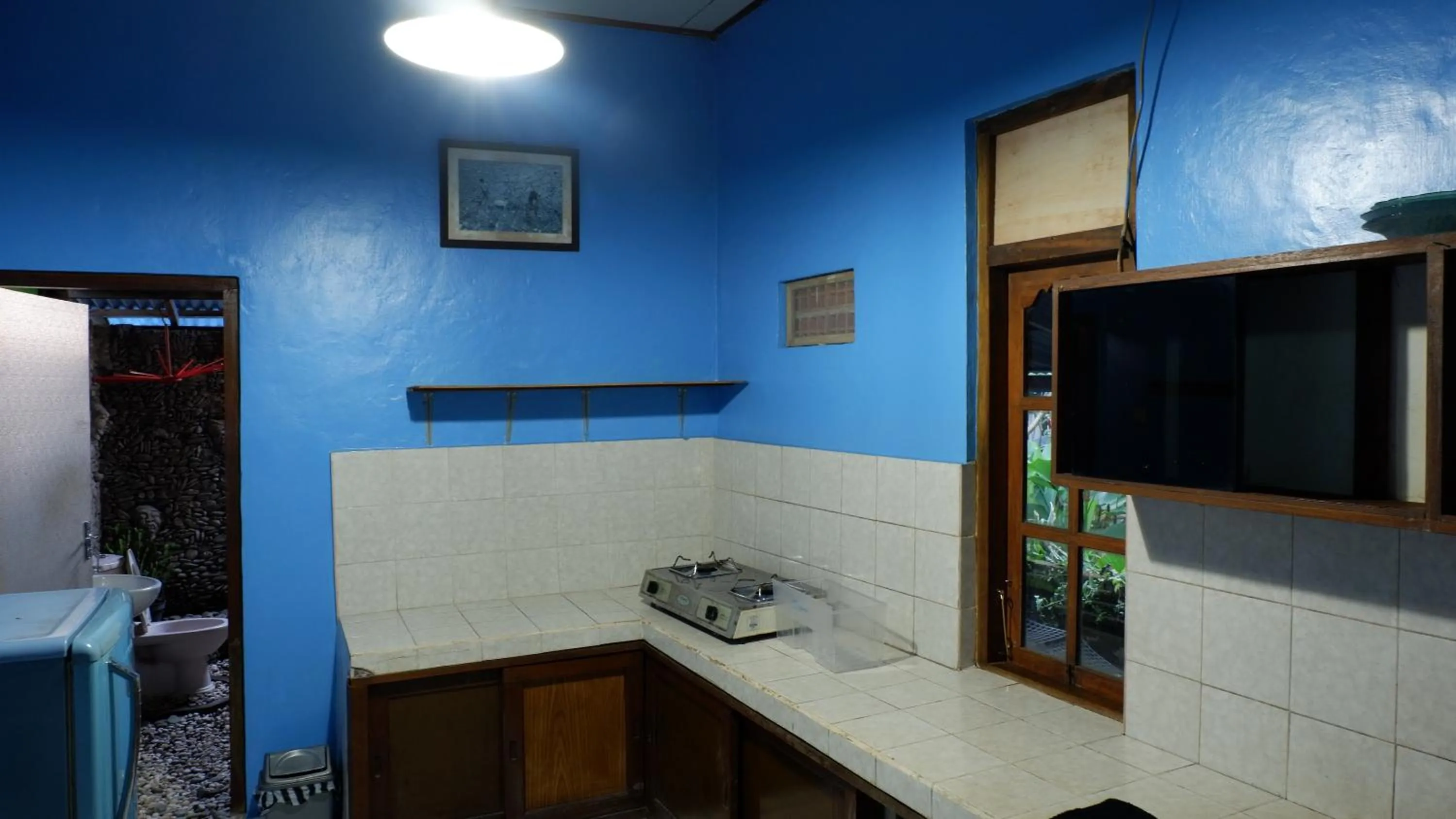Kitchen or kitchenette in Hai Homestay