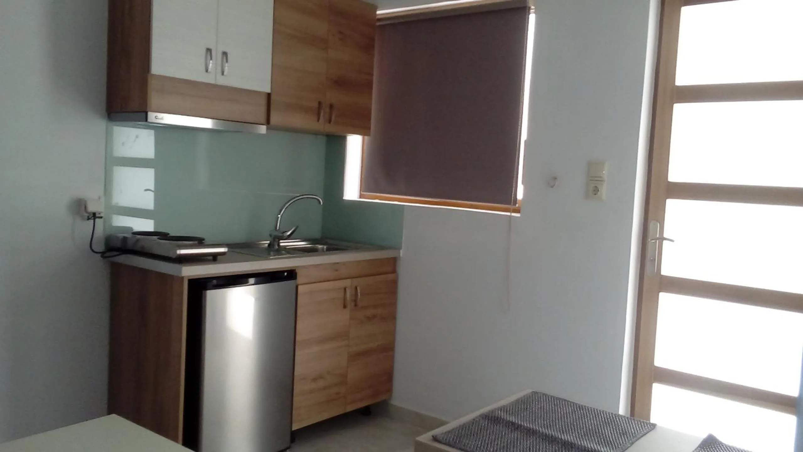 Kitchen or kitchenette in Beloni Apartments and Studios