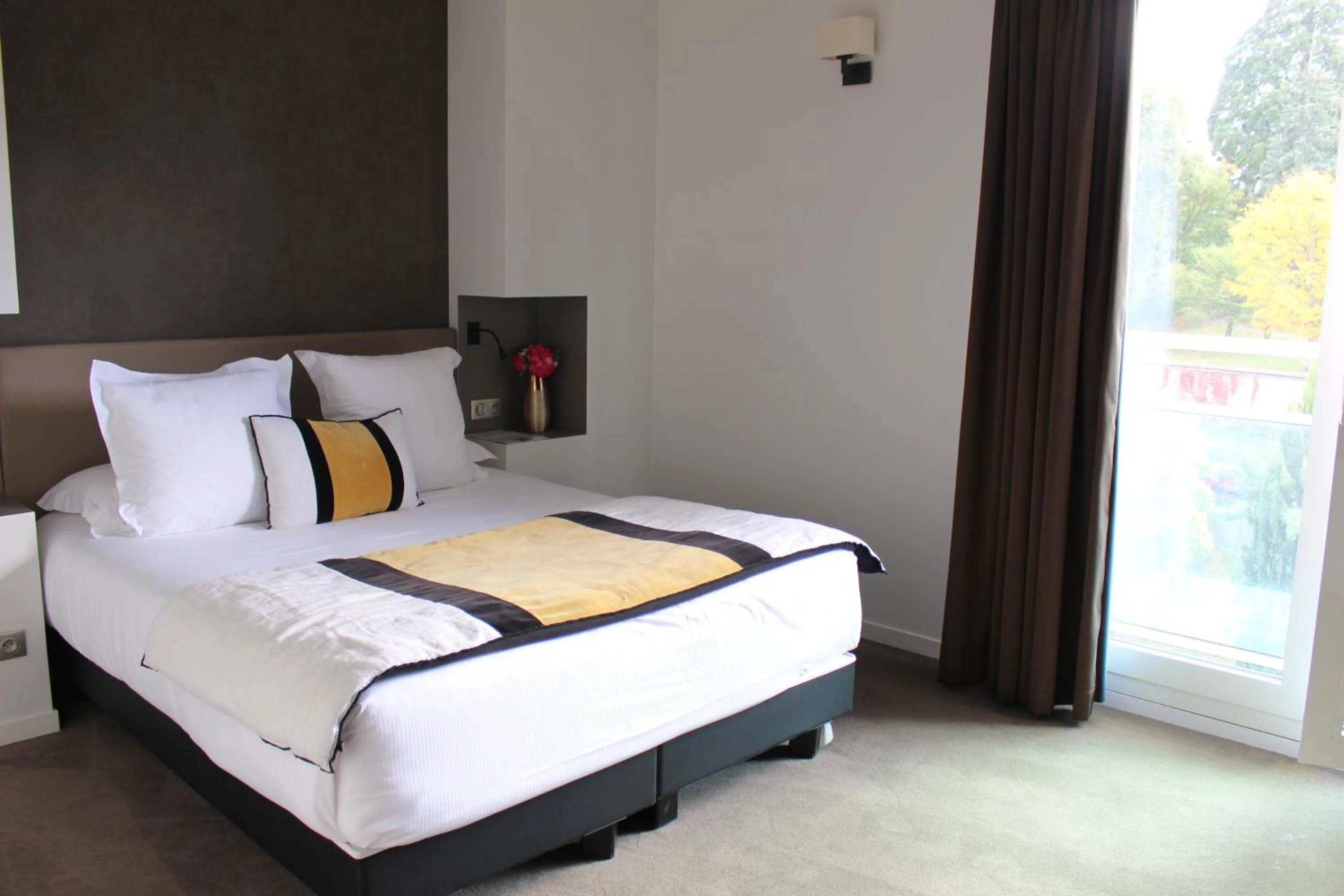 Bed in Le Konine - Hotel & Bar & Restaurant