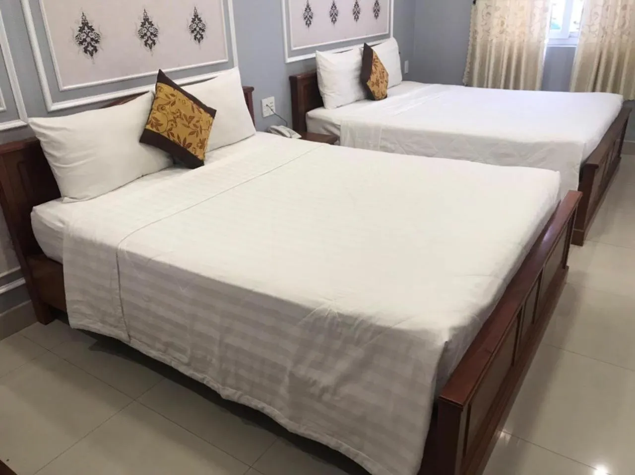 Bed in THANH TAI HOTEl 1
