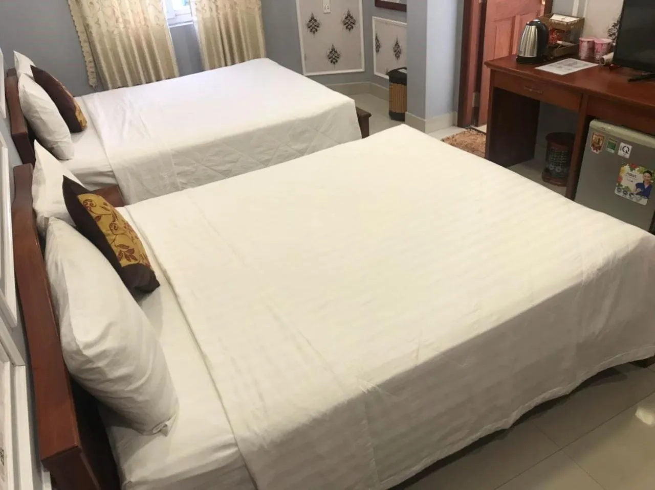 Bed in THANH TAI HOTEl 1