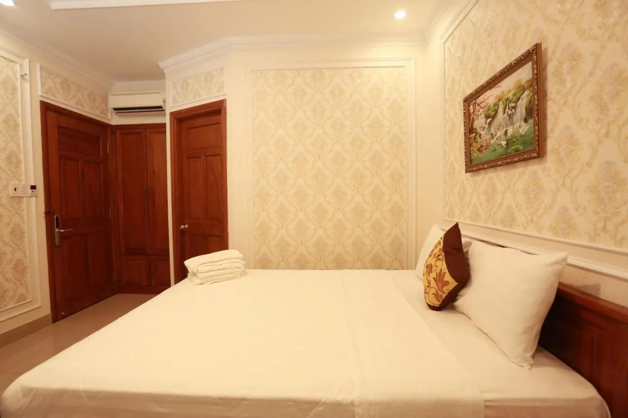 Bed in THANH TAI HOTEl 1