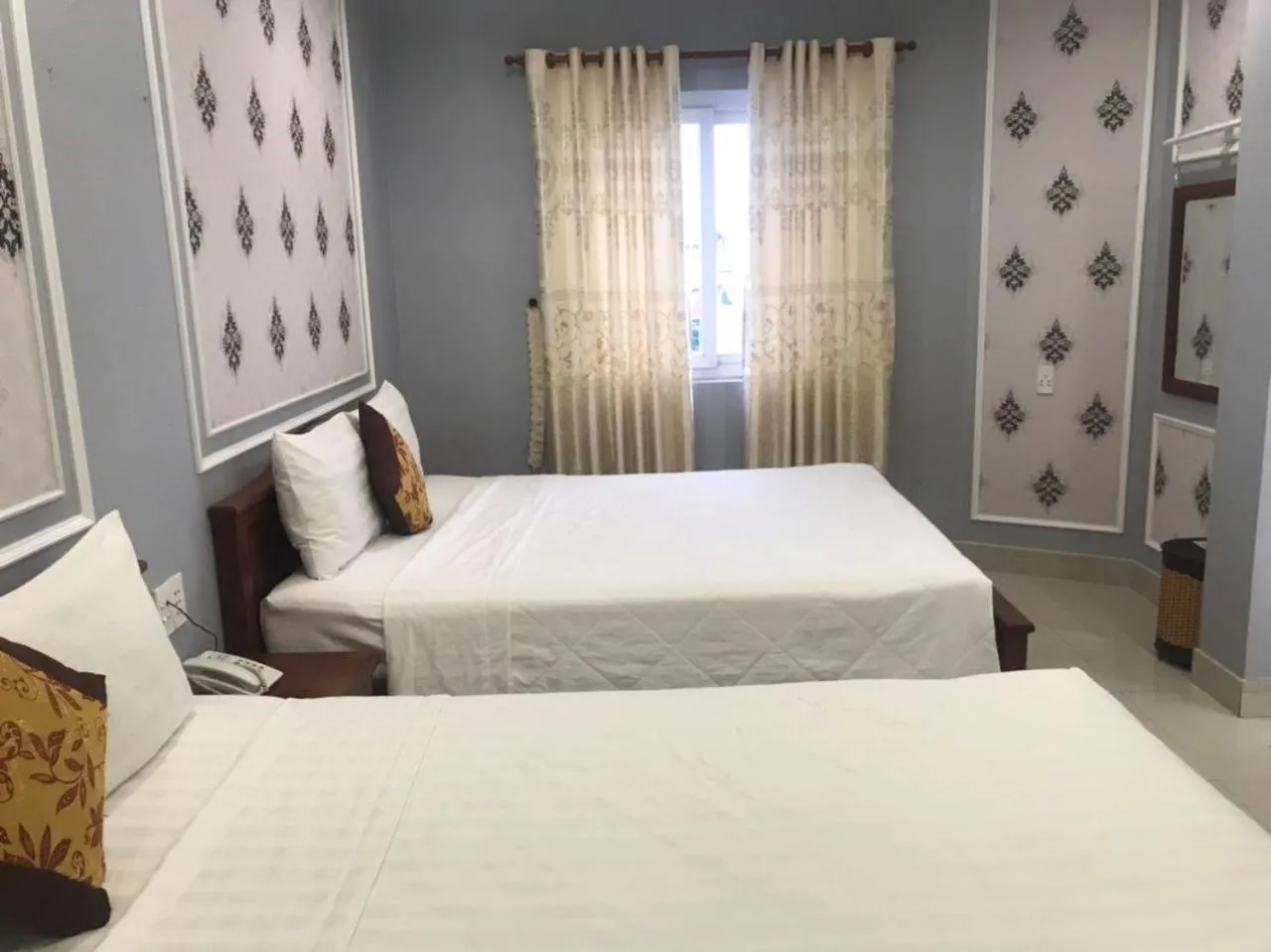 Bed in THANH TAI HOTEl 1