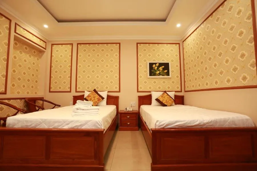 Bed in THANH TAI HOTEl 1