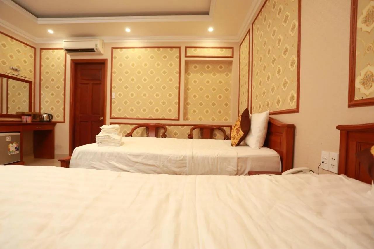 Bed in THANH TAI HOTEl 1