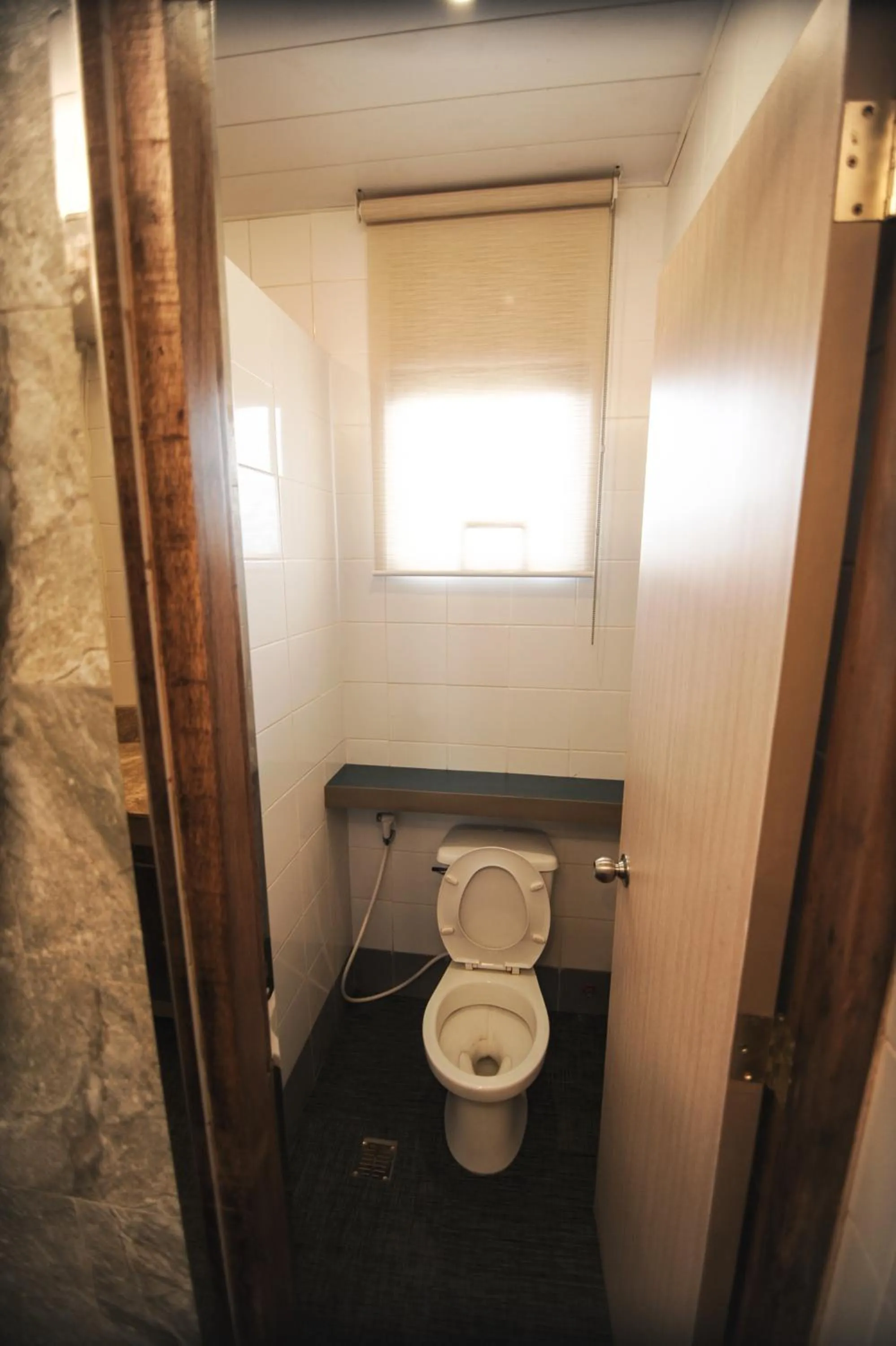 Toilet in Pine Breeze Cottages