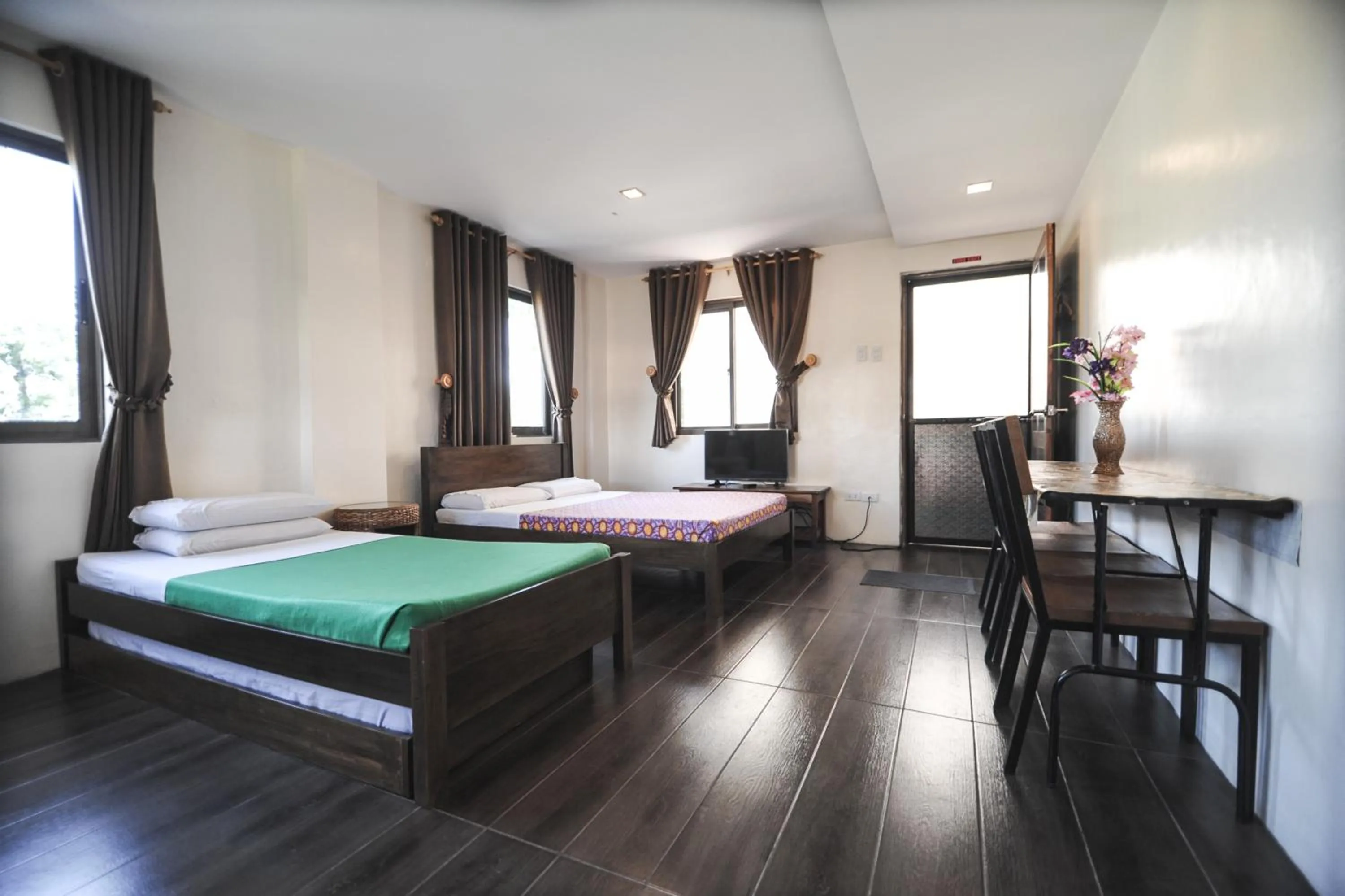 Bed in Pine Breeze Cottages