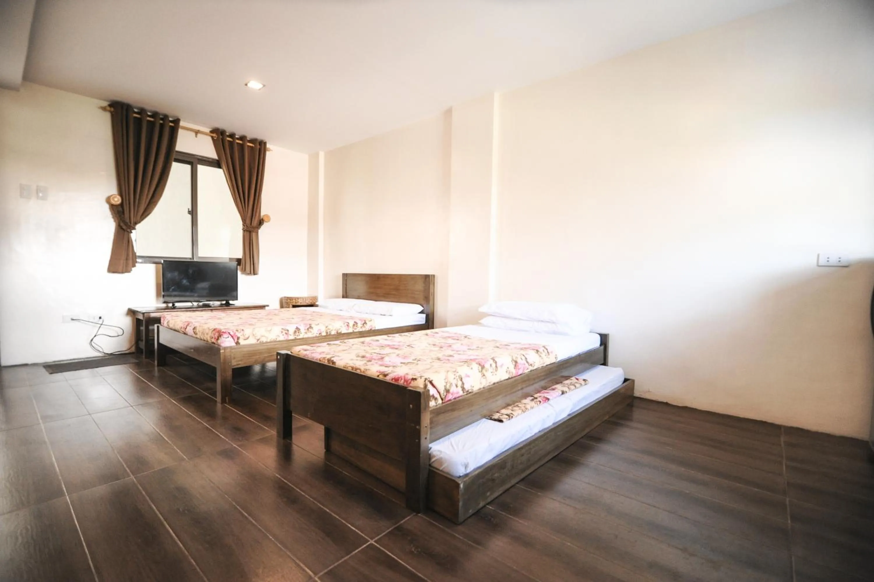 Bed in Pine Breeze Cottages