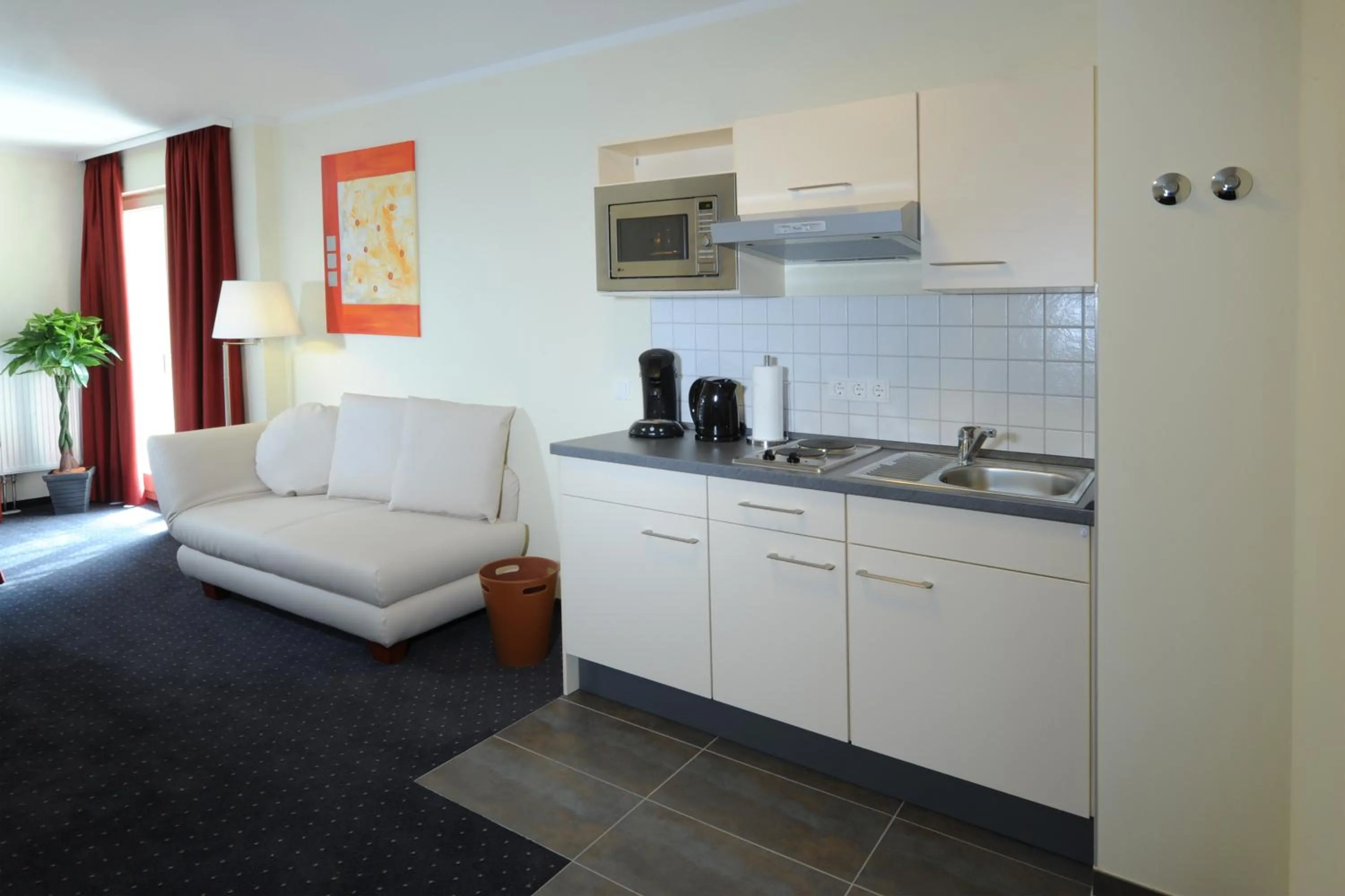 Kitchen or kitchenette in SchlafGut AppartementHotel