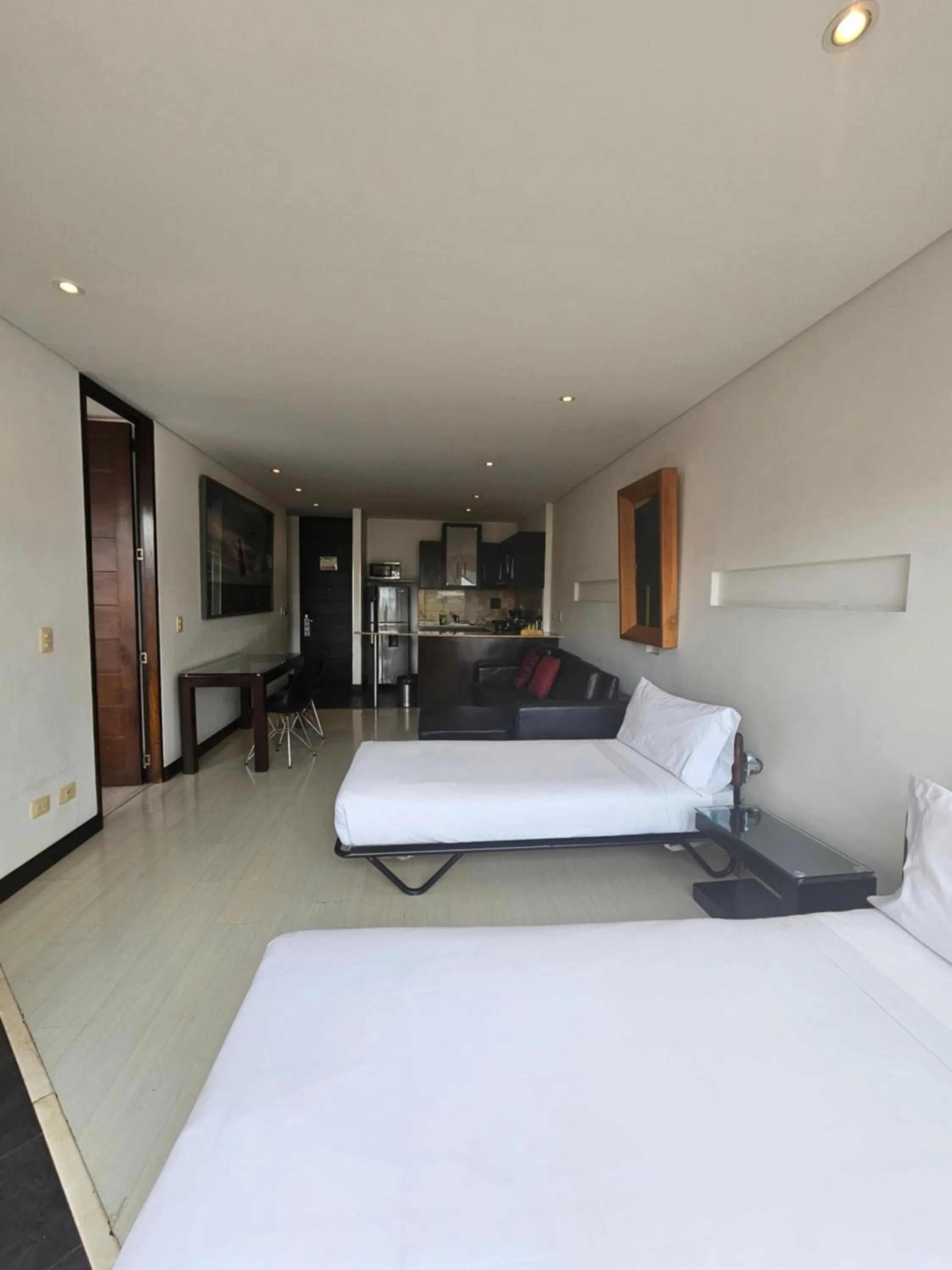 Bed in Hotel 104 Art Suites