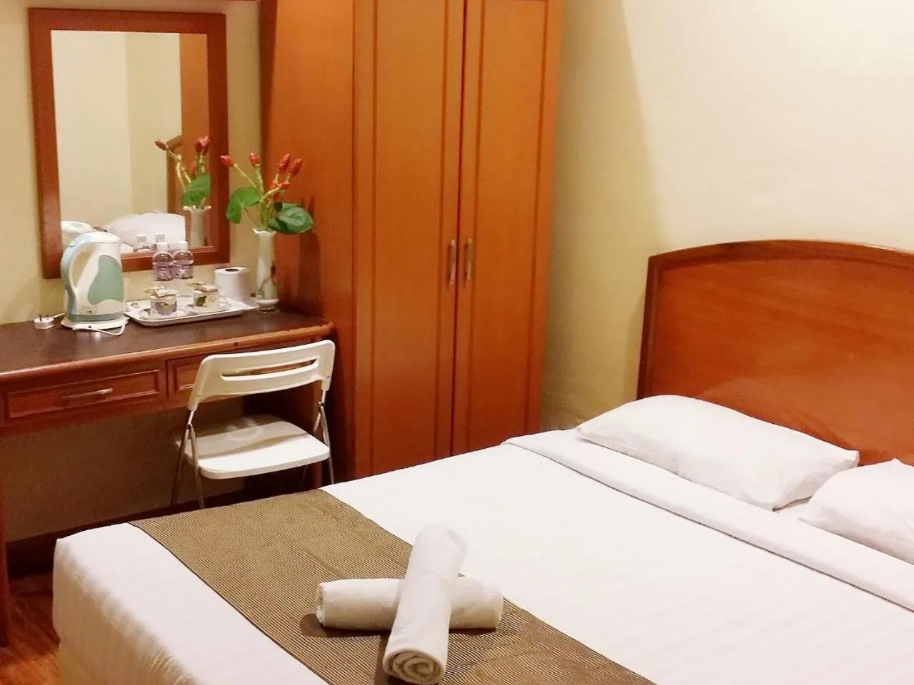 Bed in SkyGlobal Hotel