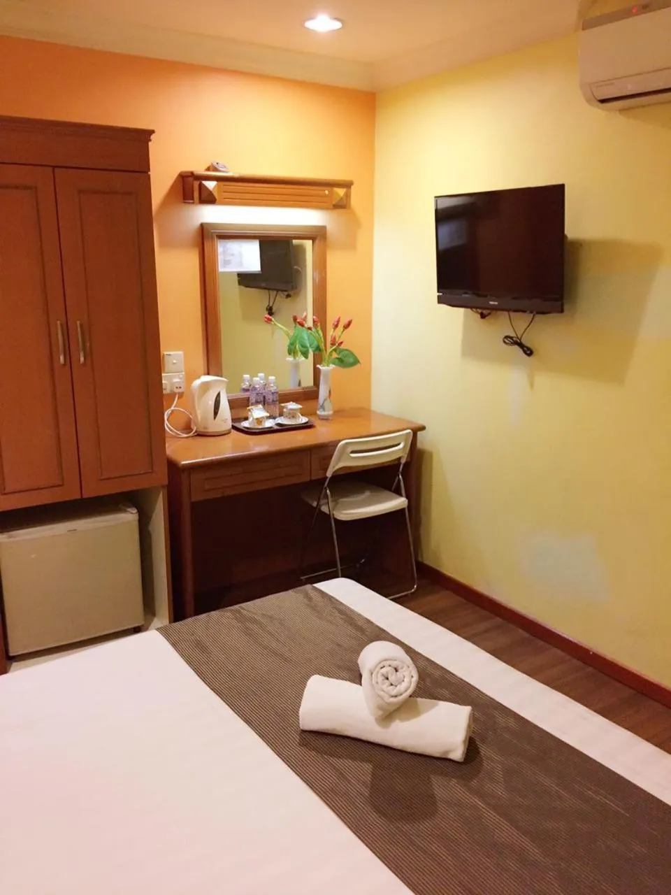 Bed in SkyGlobal Hotel