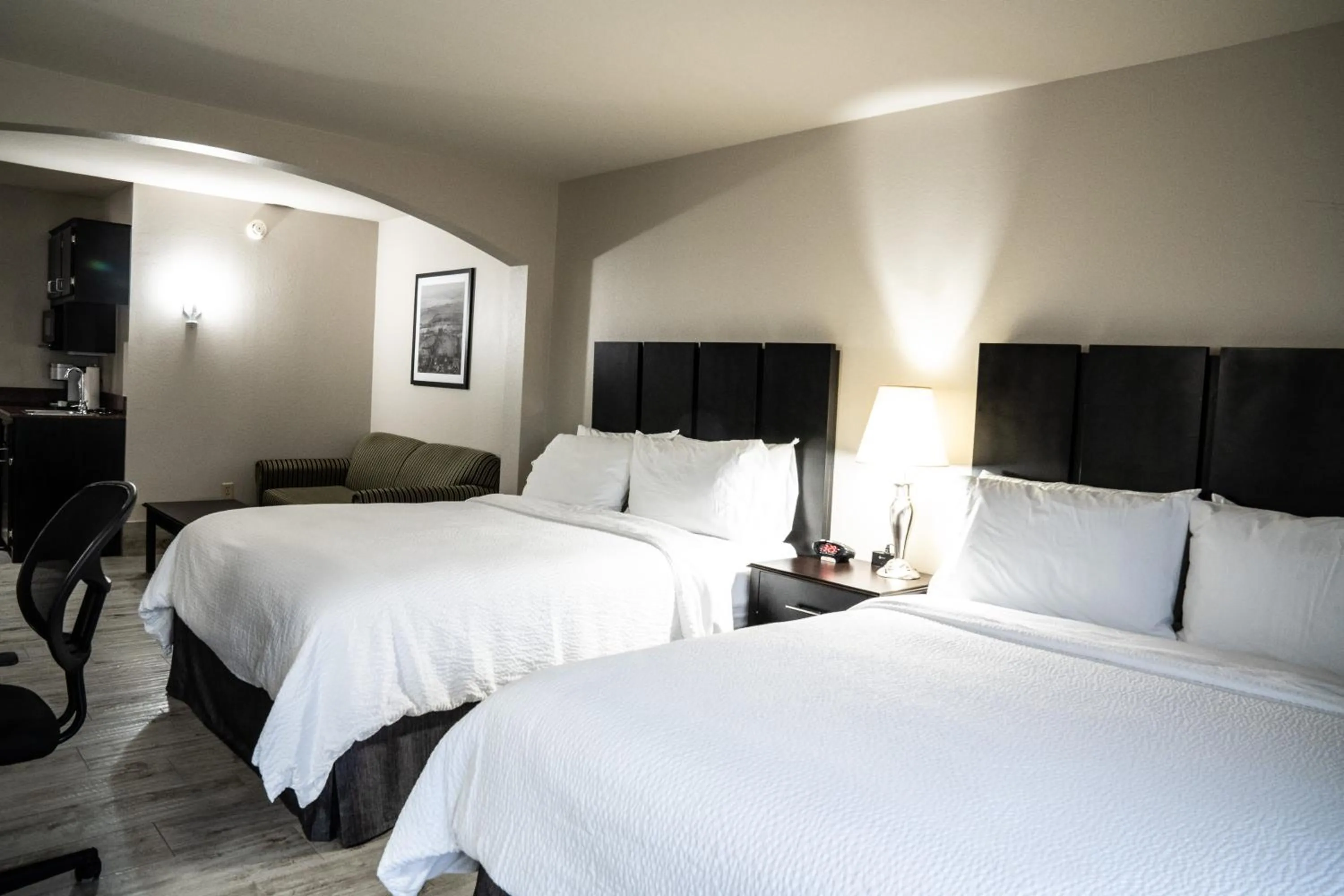 Bed in Lucille's Hotel, Restaurant, & Bar