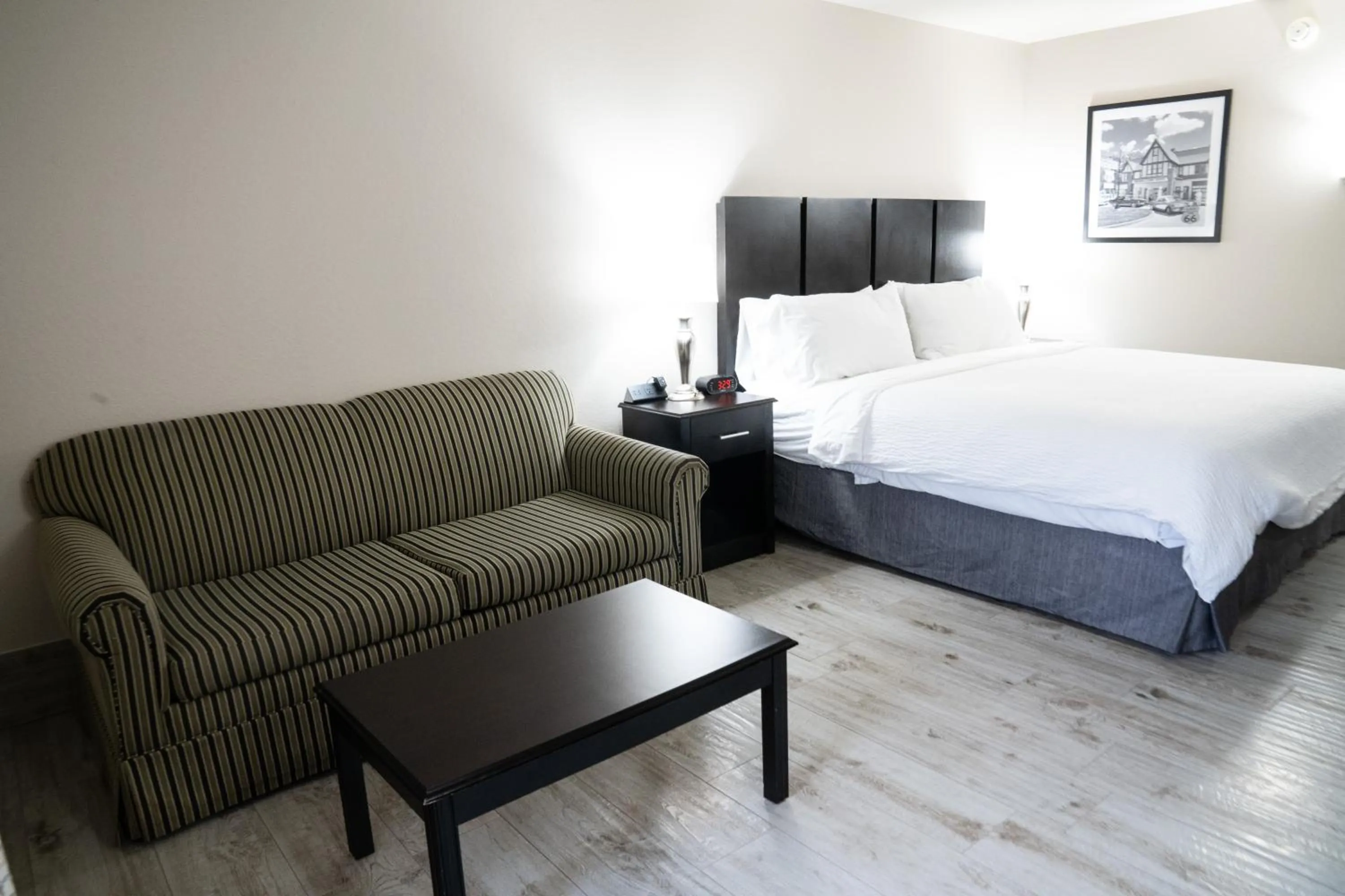 Bed in Lucille's Hotel, Restaurant, & Bar