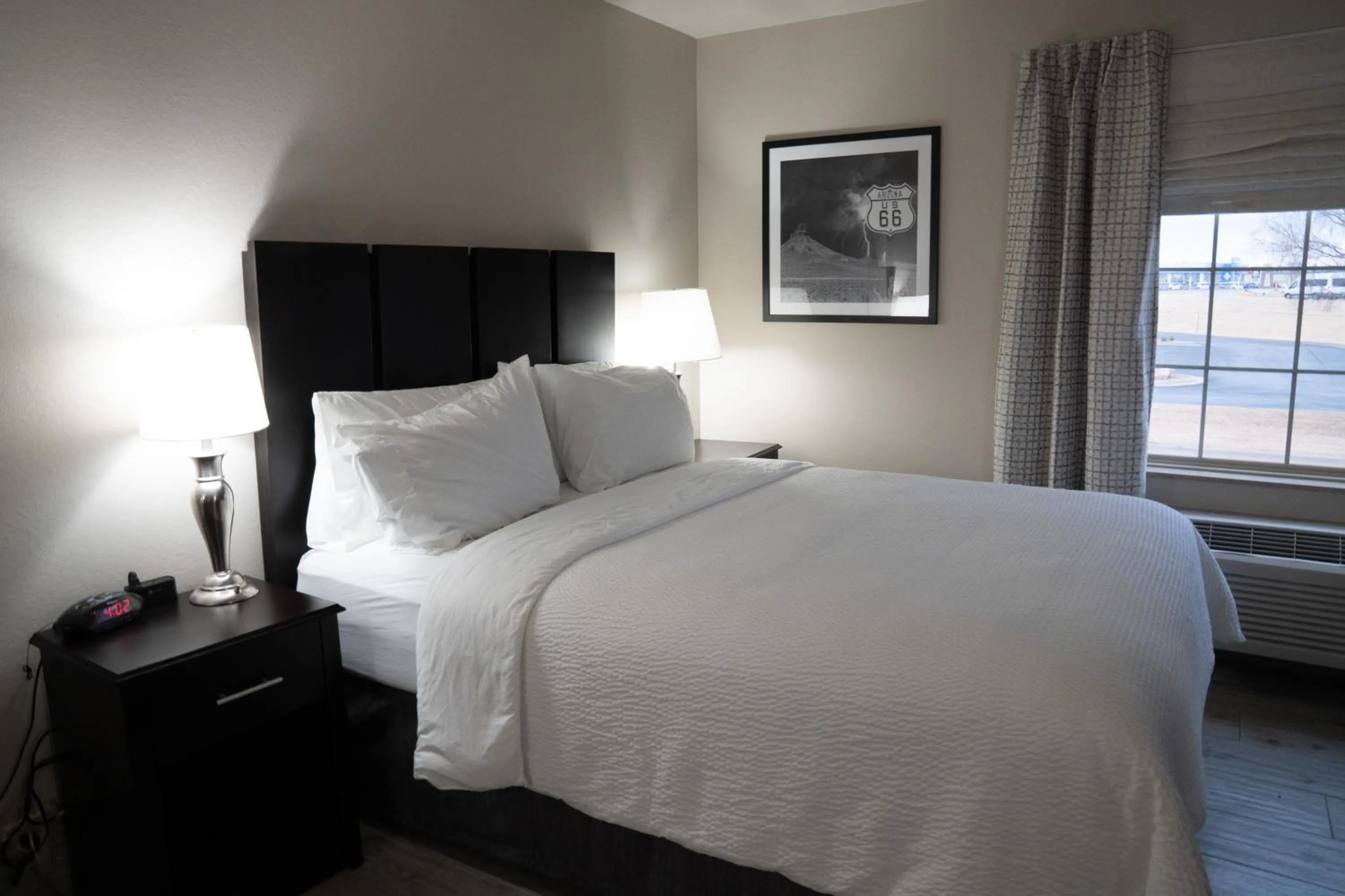 Bed in Lucille's Hotel, Restaurant, & Bar