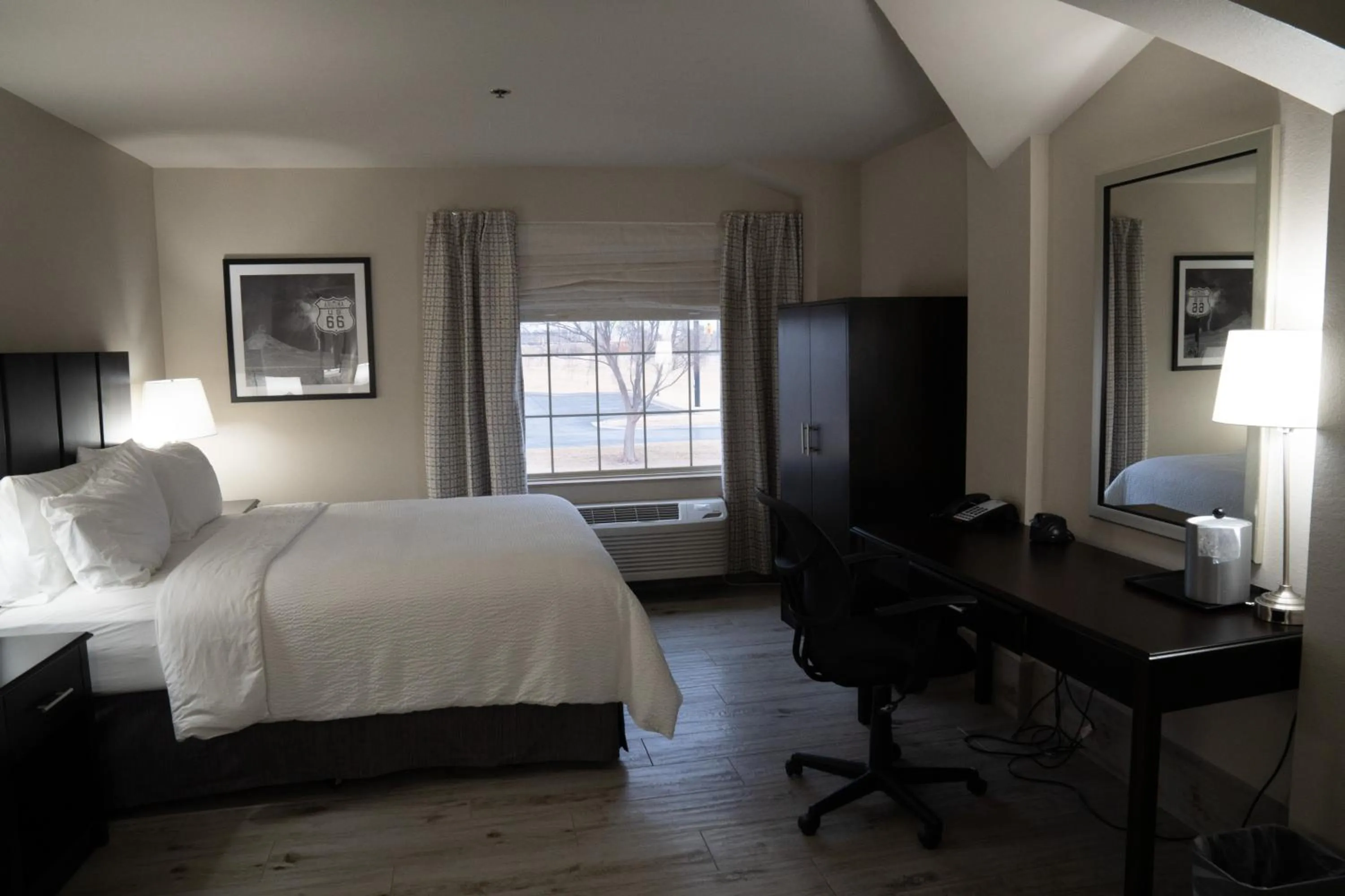 Bed in Lucille's Hotel, Restaurant, & Bar