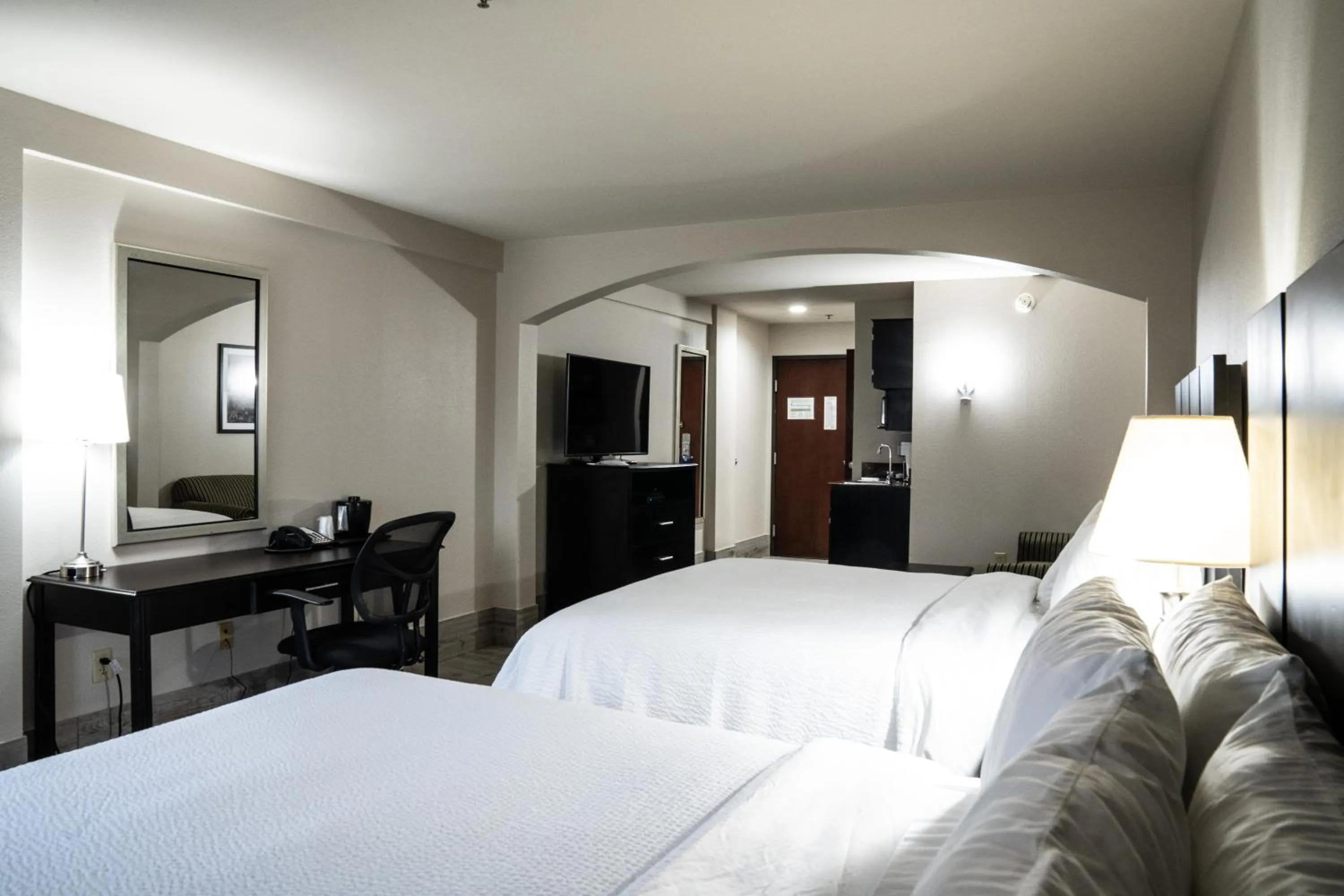 Bed in Lucille's Hotel, Restaurant, & Bar