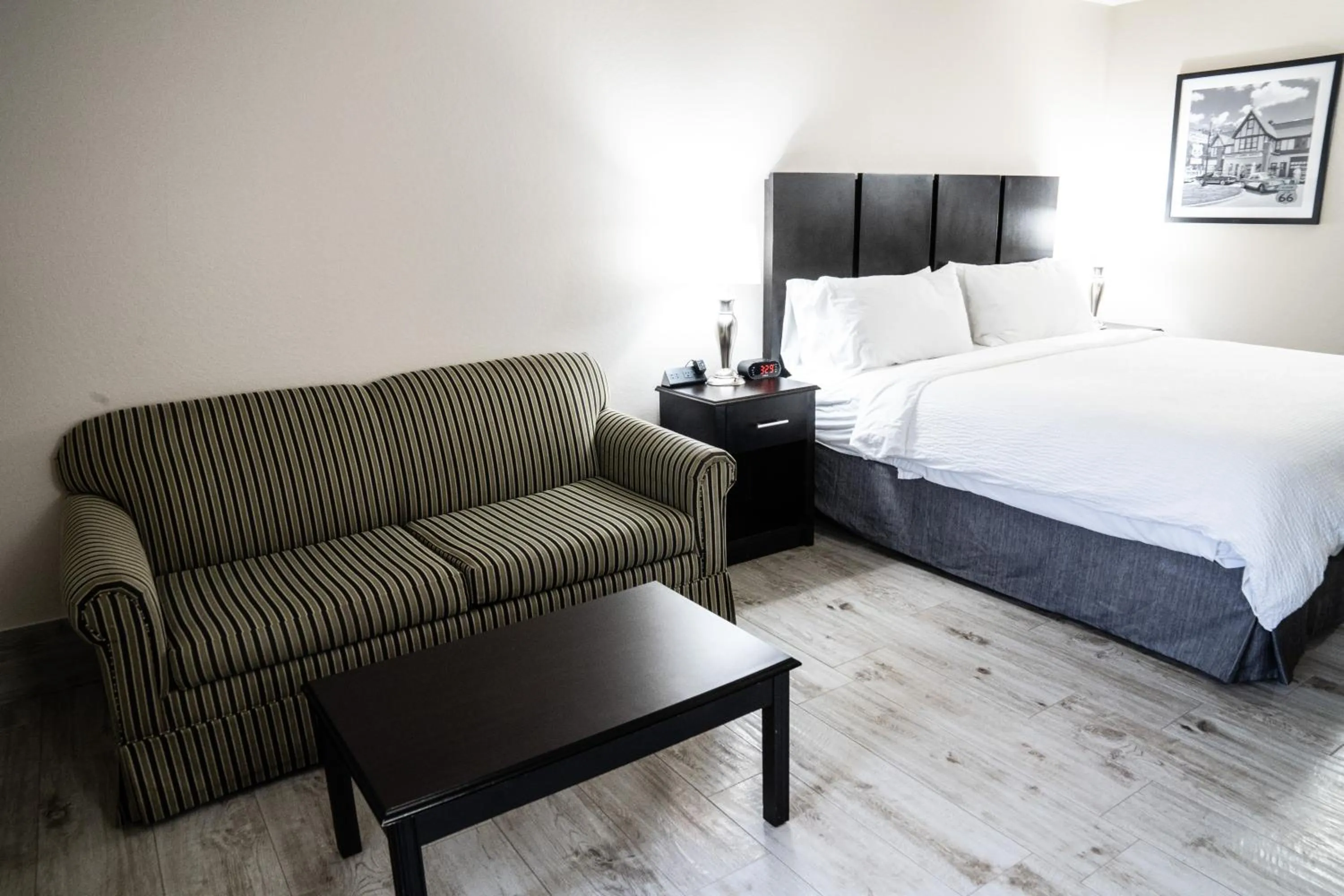 Bedroom, Bed in Lucille's Hotel, Restaurant, & Bar