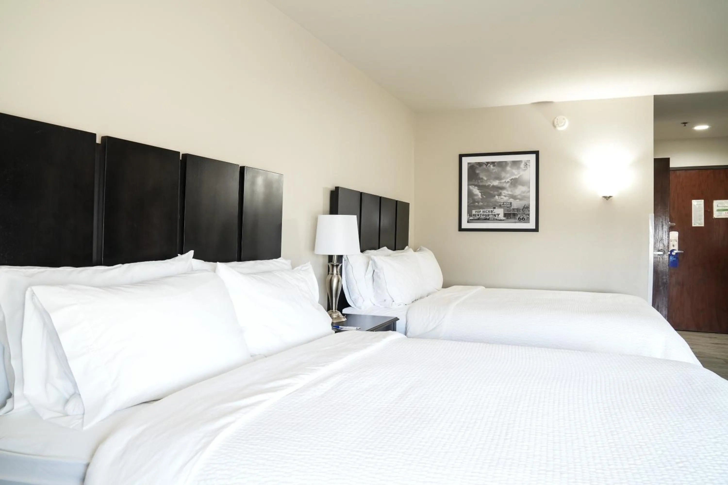 Bed in Lucille's Hotel, Restaurant, & Bar