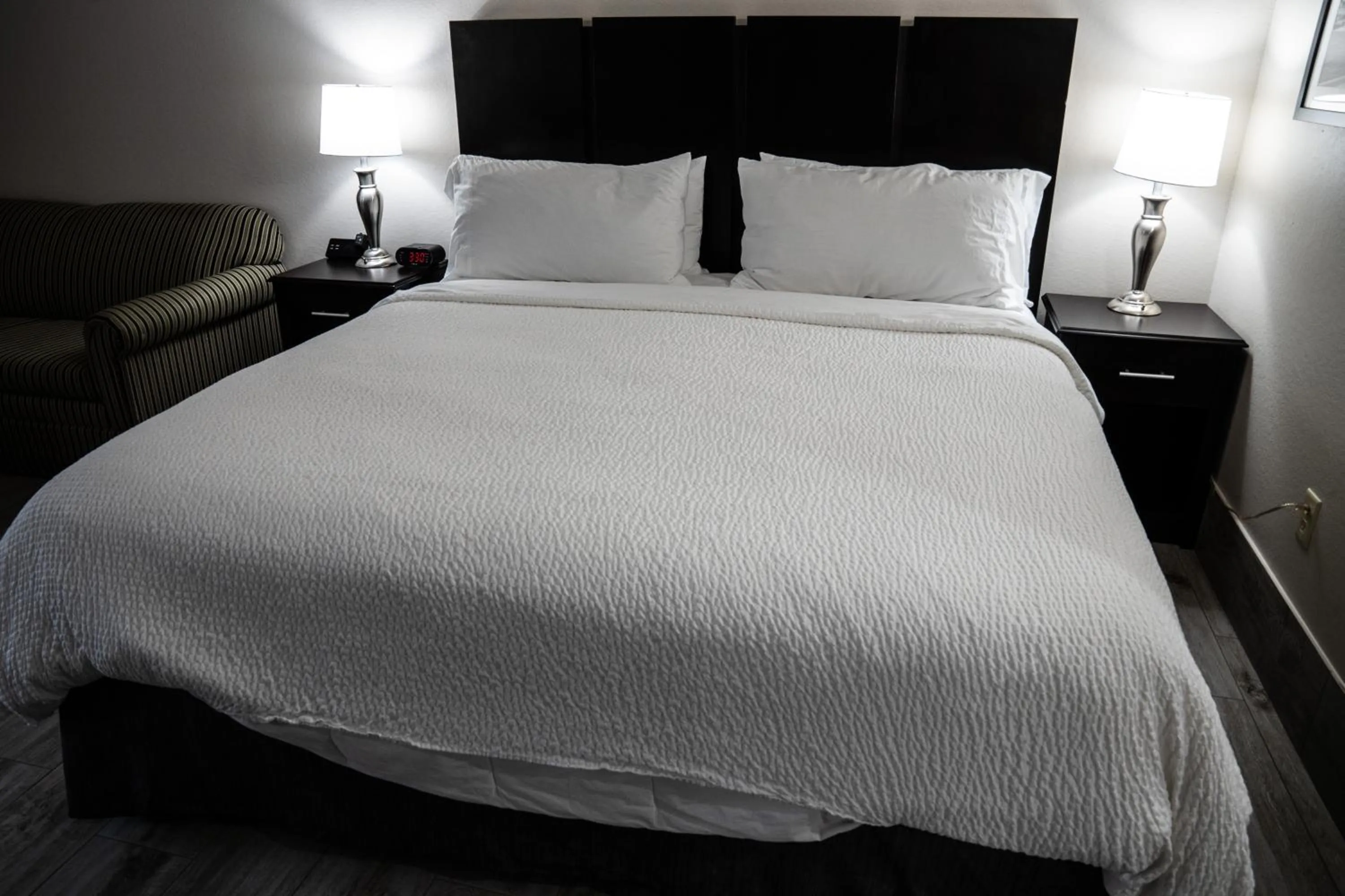 Bed in Lucille's Hotel, Restaurant, & Bar