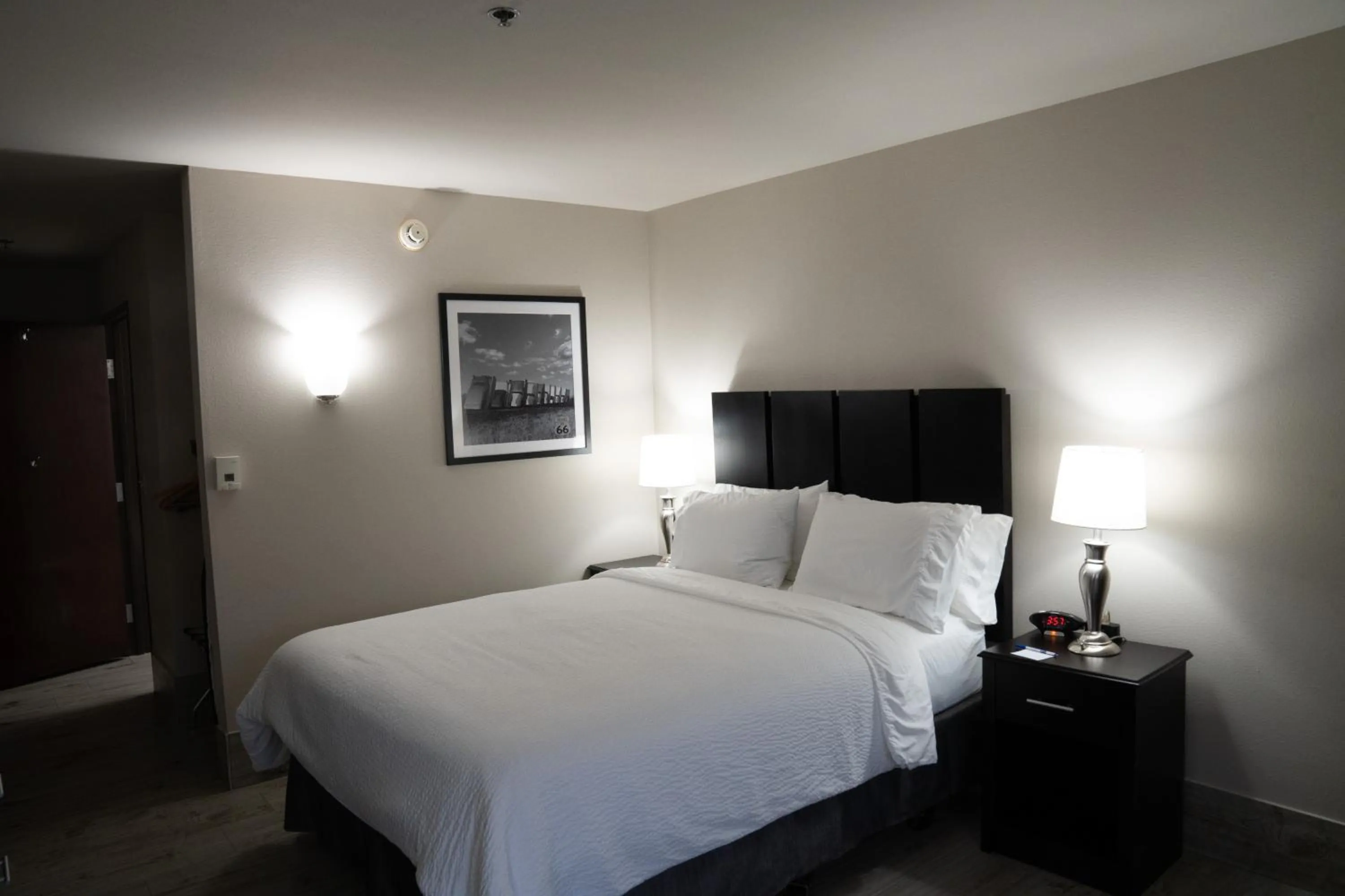 Bed in Lucille's Hotel, Restaurant, & Bar