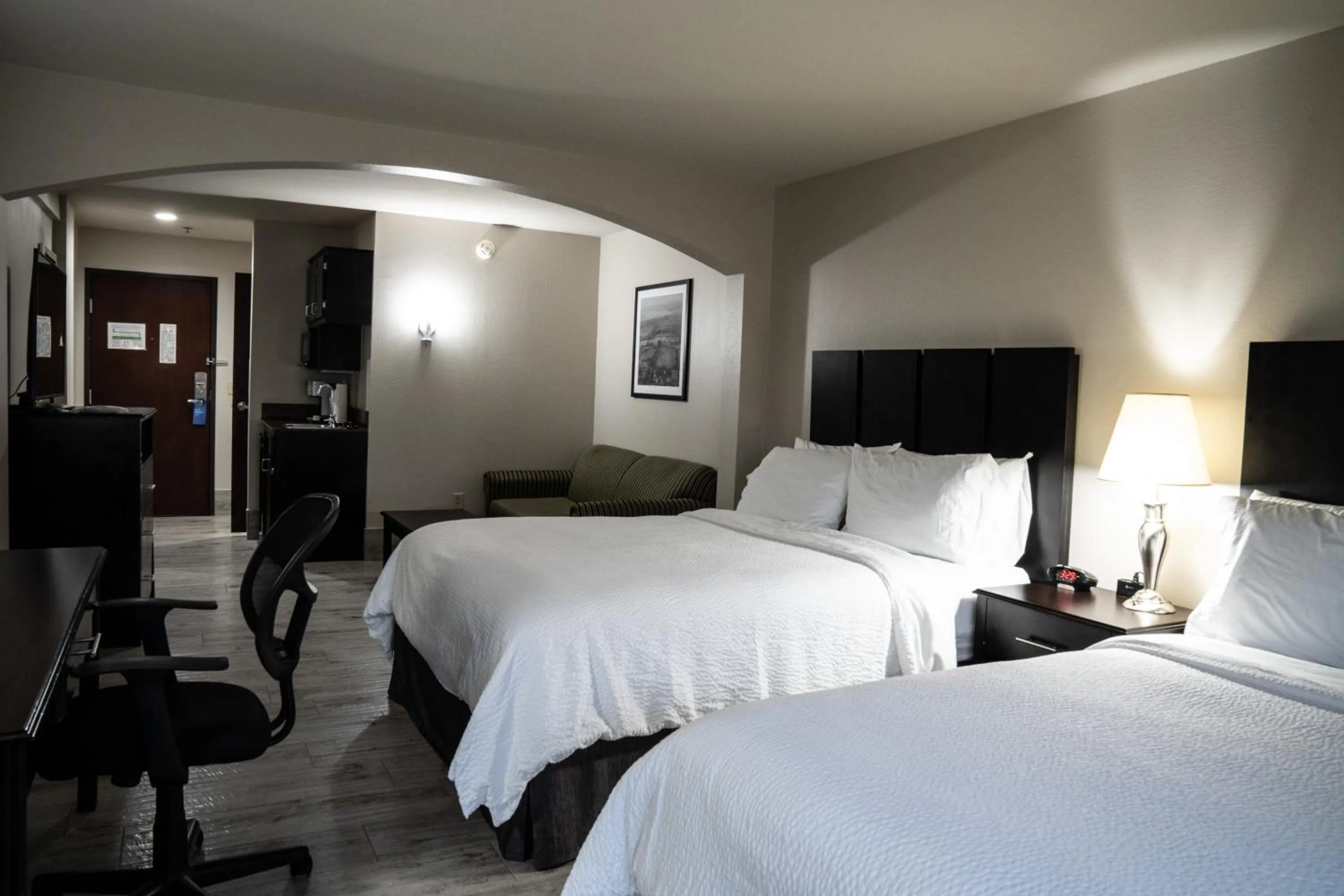 Bed in Lucille's Hotel, Restaurant, & Bar