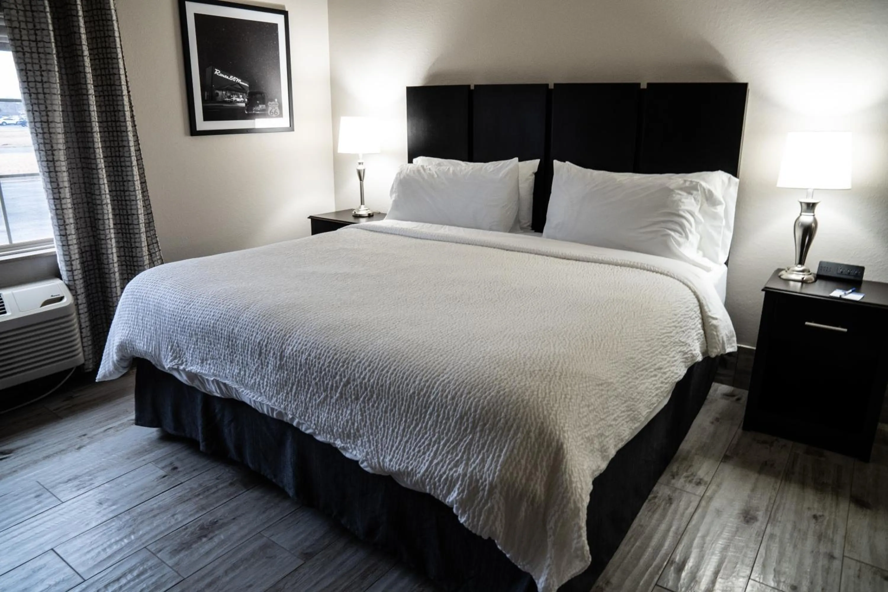 Bed in Lucille's Hotel, Restaurant, & Bar