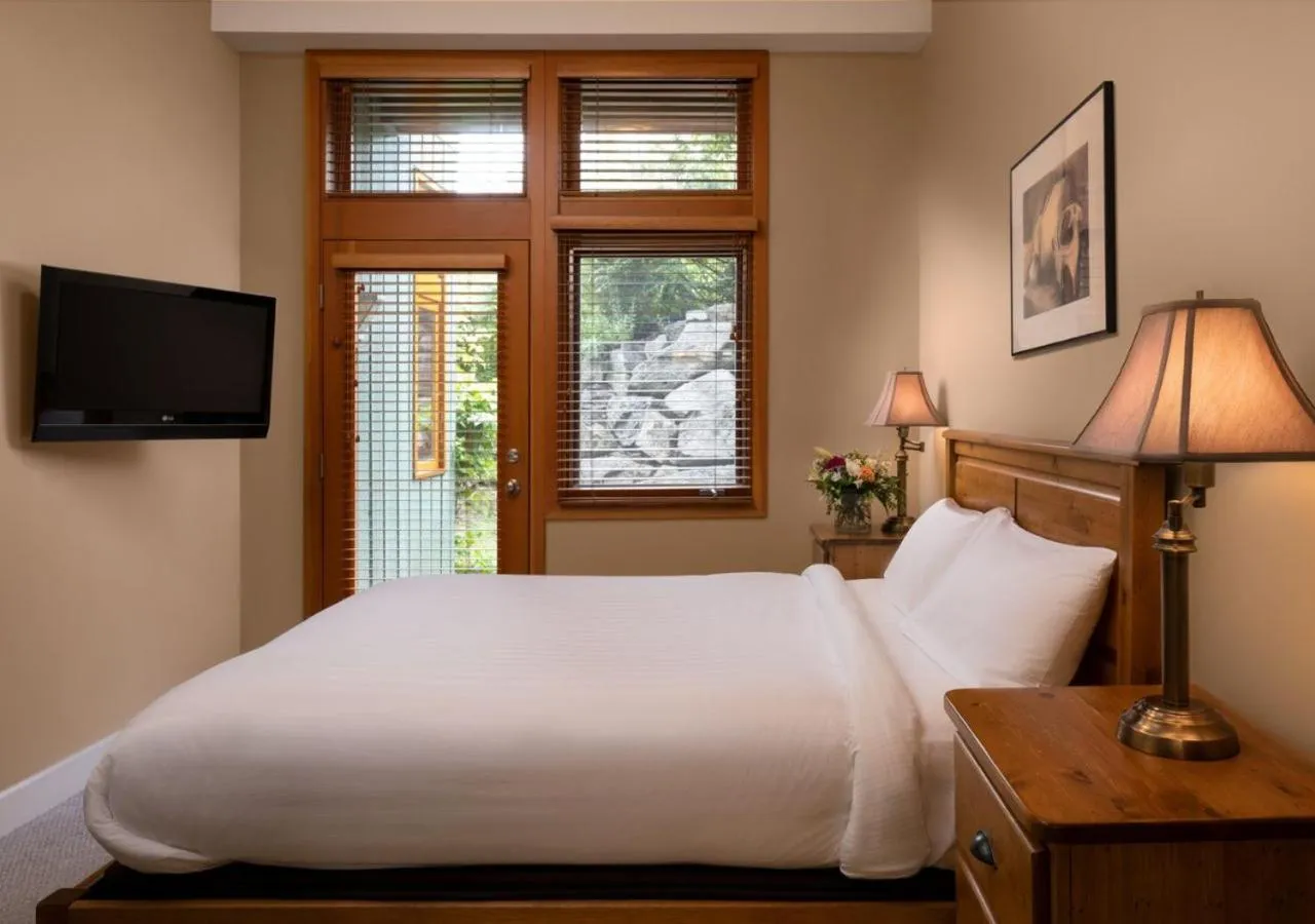 Bed in Outback Lakeside Vacation Homes