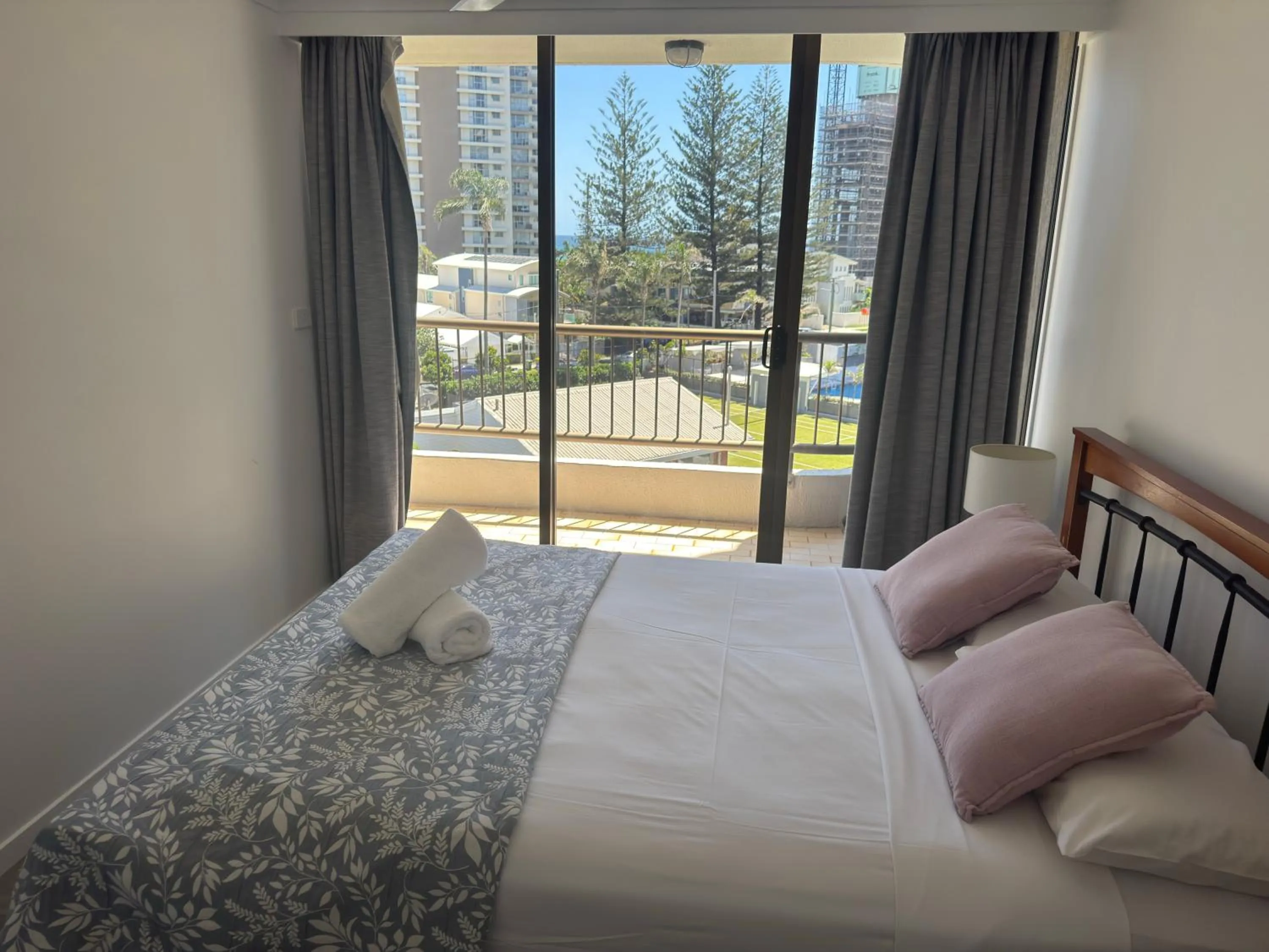 Bed in Aristocrat Apartments