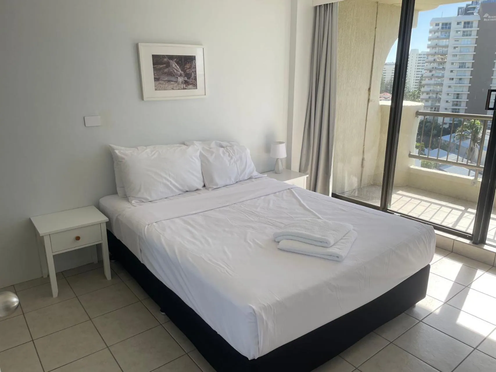 Bed in Aristocrat Apartments