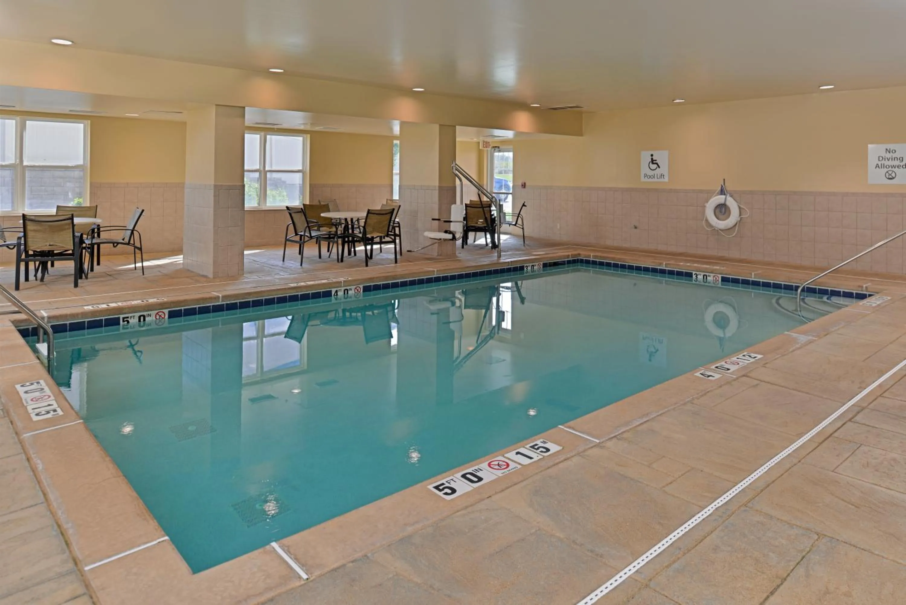 Swimming pool in Holiday Inn Express Hotel & Suites St. Louis West-O'Fallon by IHG
