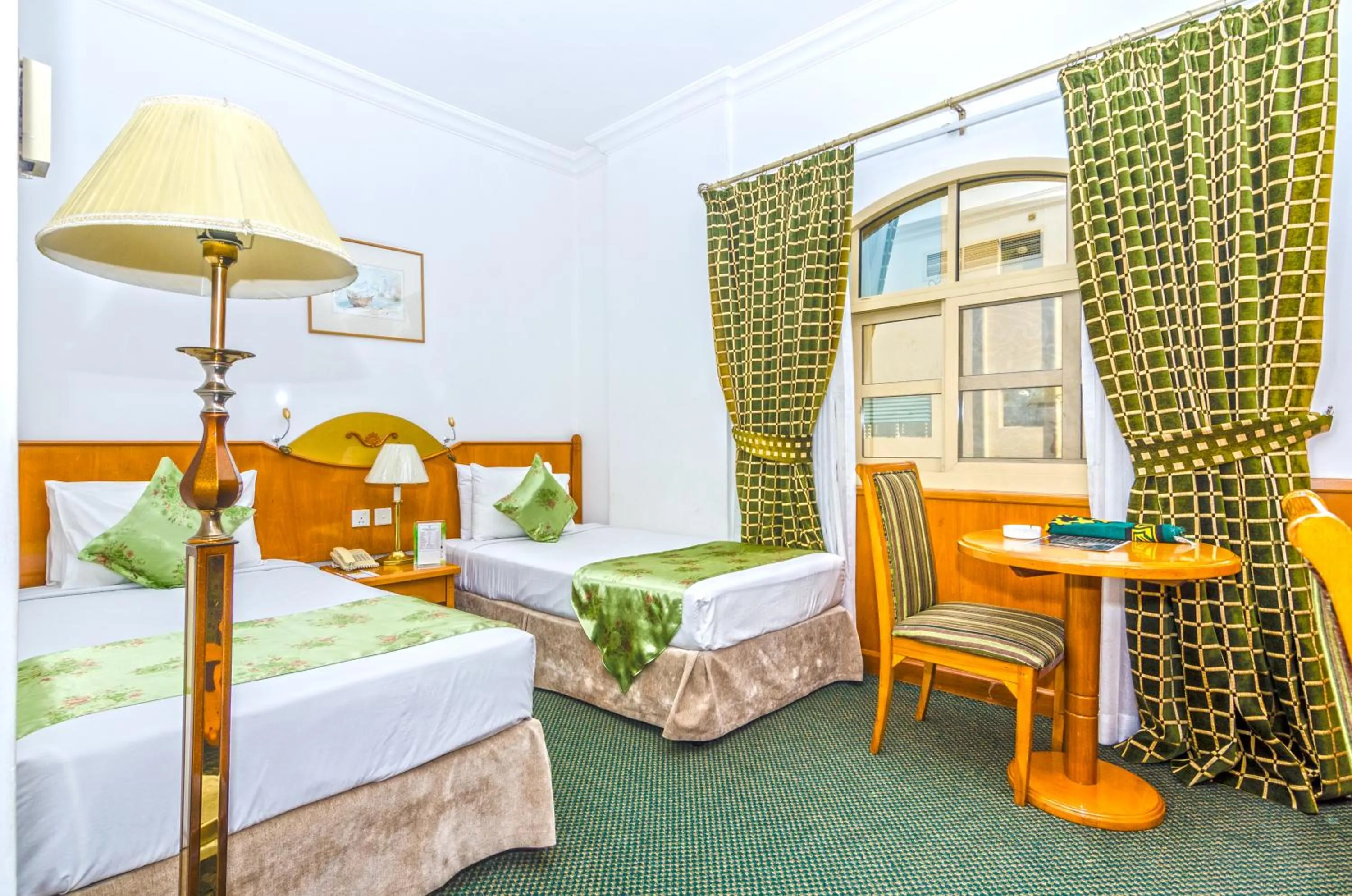 Bed in Zain International Hotel