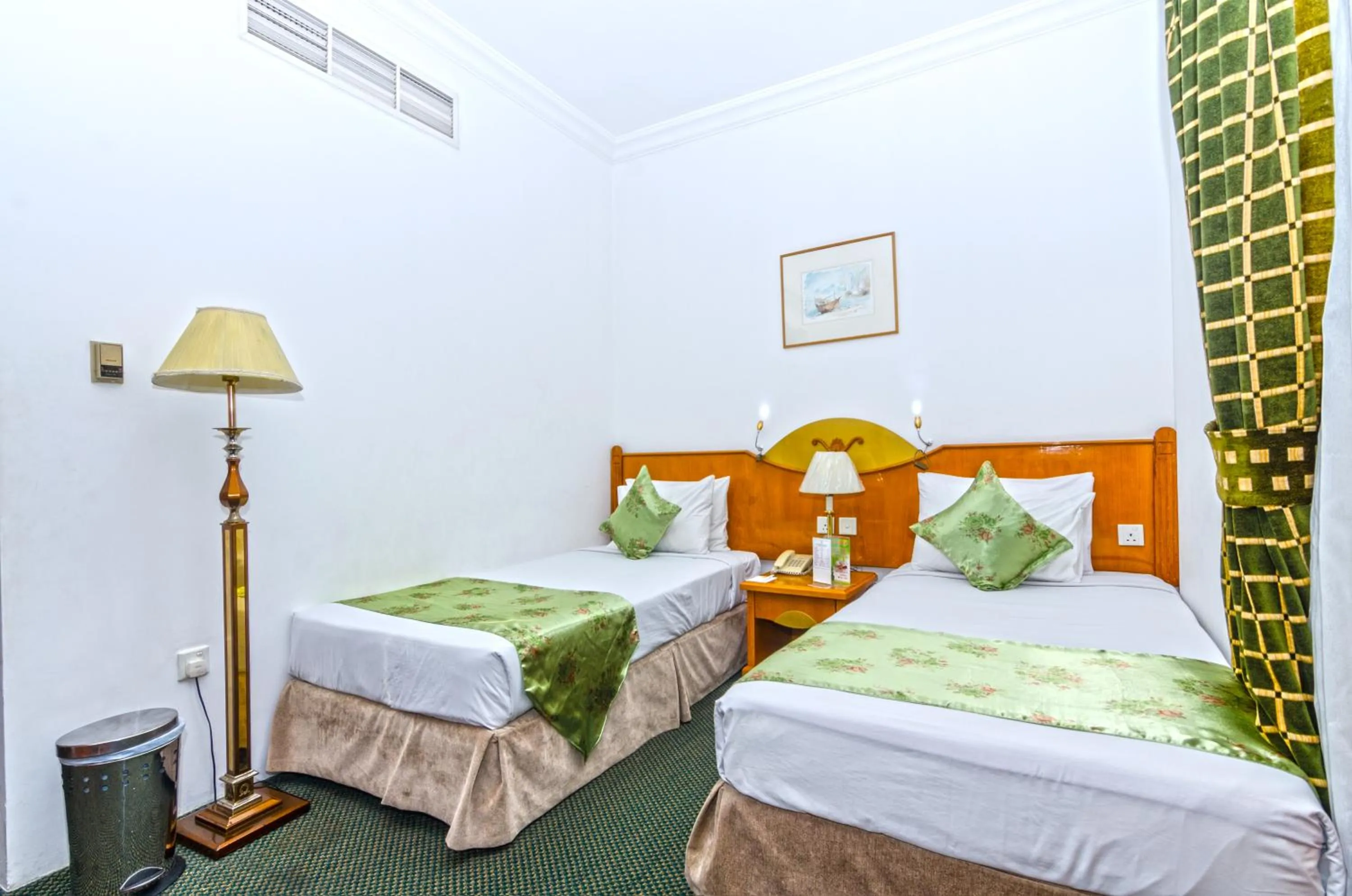 Bed in Zain International Hotel