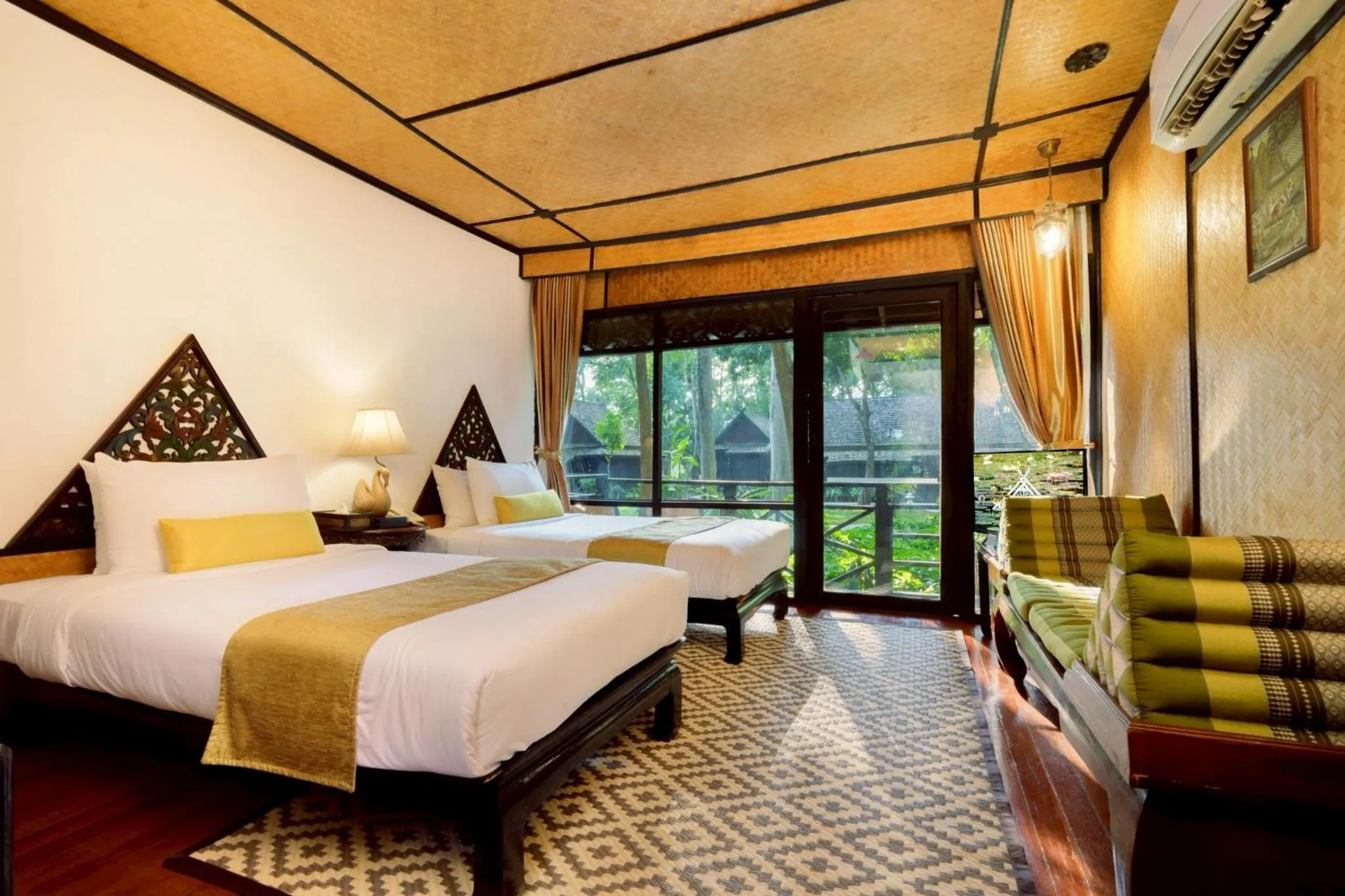 Bed in Lampang River Lodge