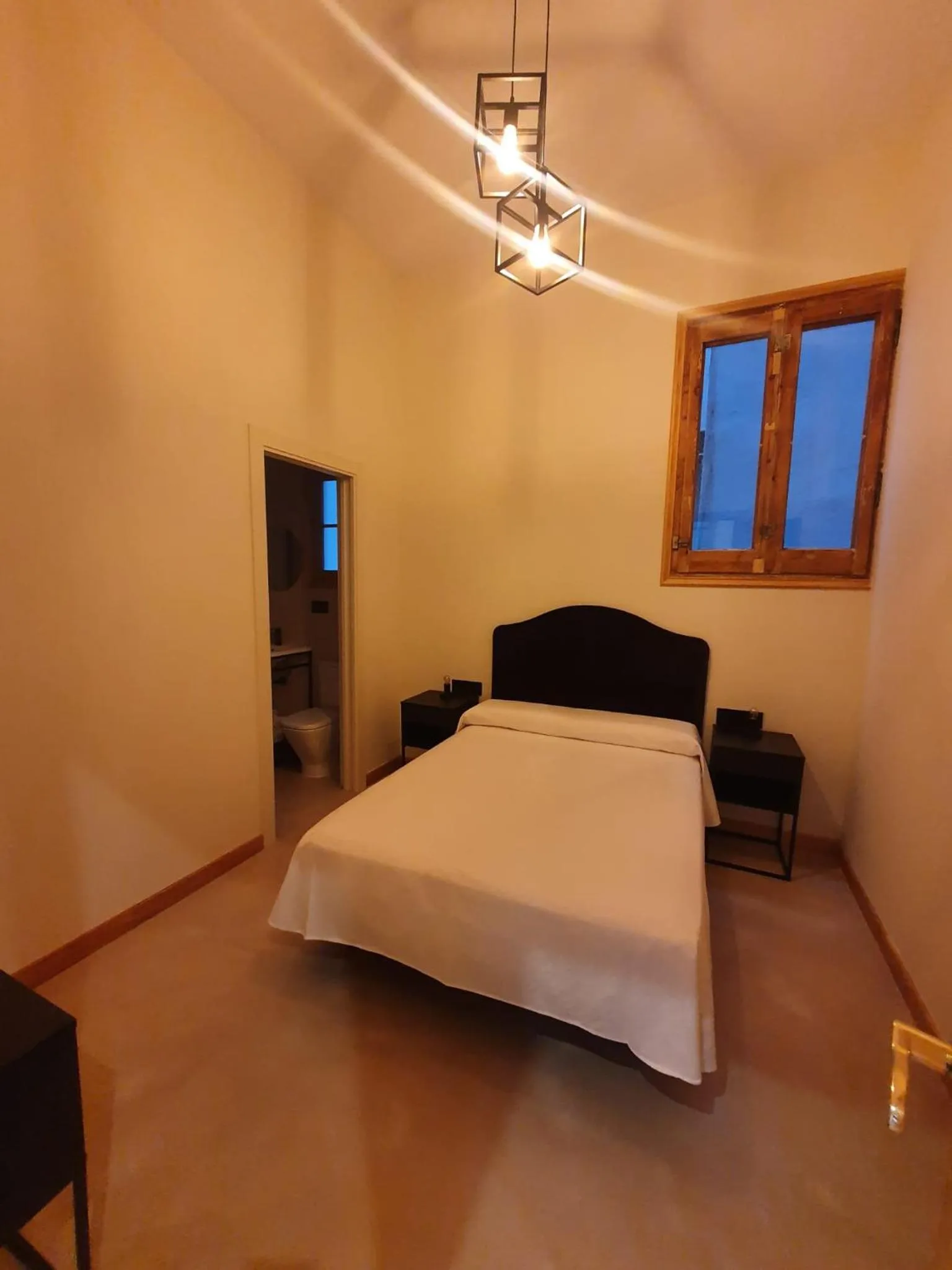 Photo of the whole room, Bed in Hostal Lausanne