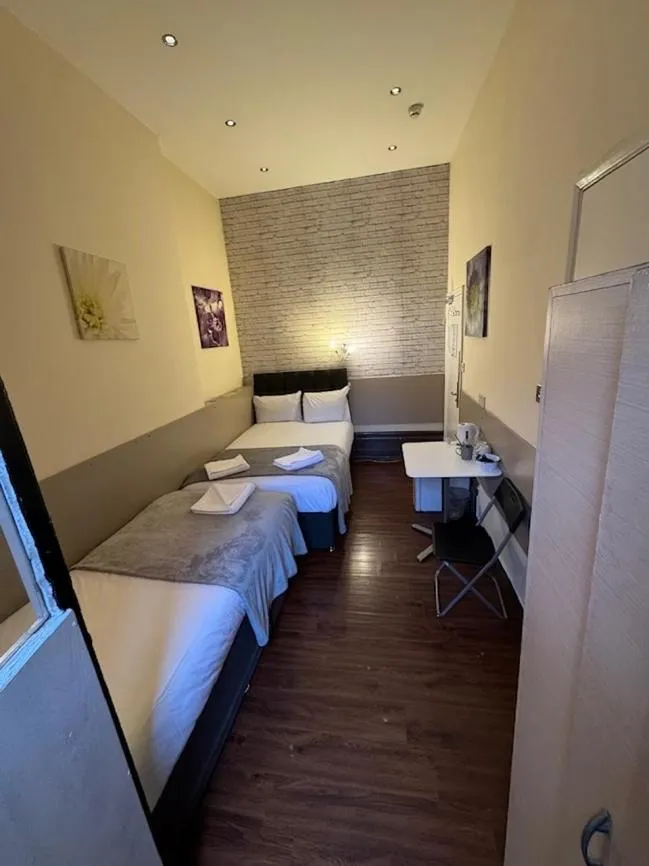 Bed in Tony's House Hotel