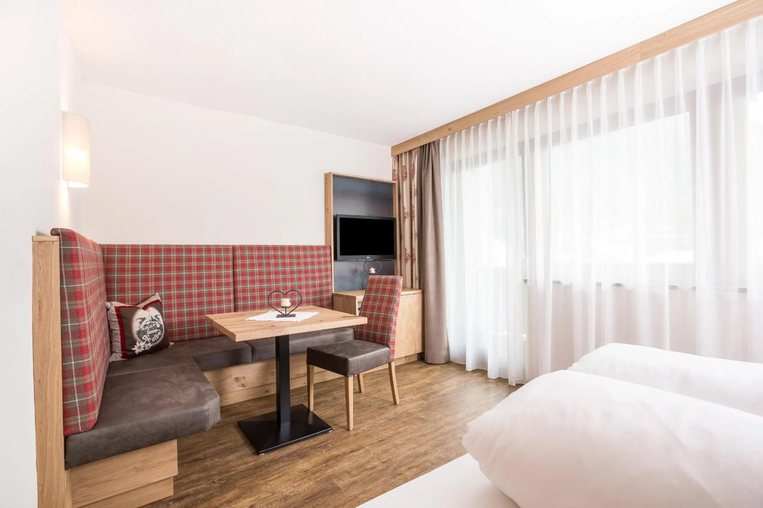 Seating area, Bed in Hotel Augarten