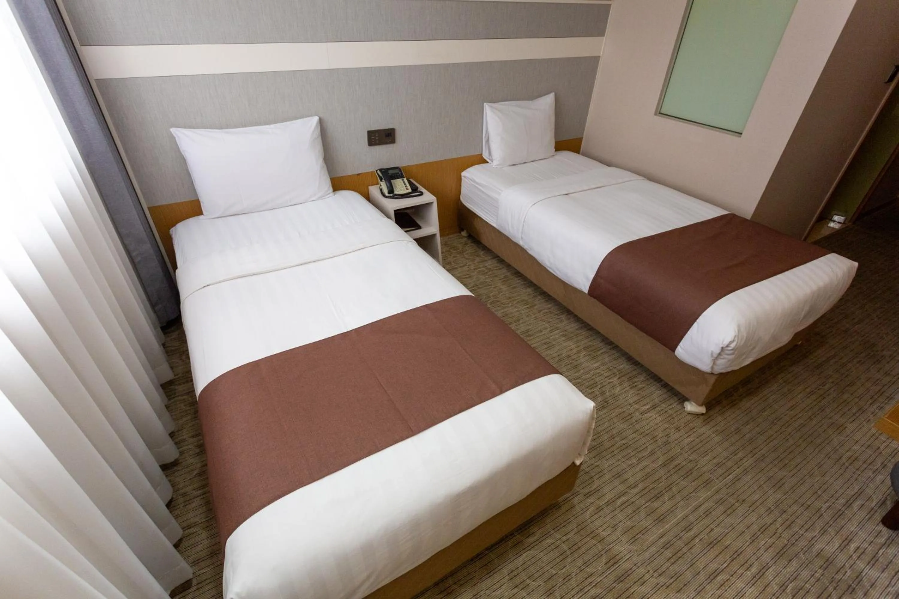 Bed in The Recenz Dongdaemun Hotel
