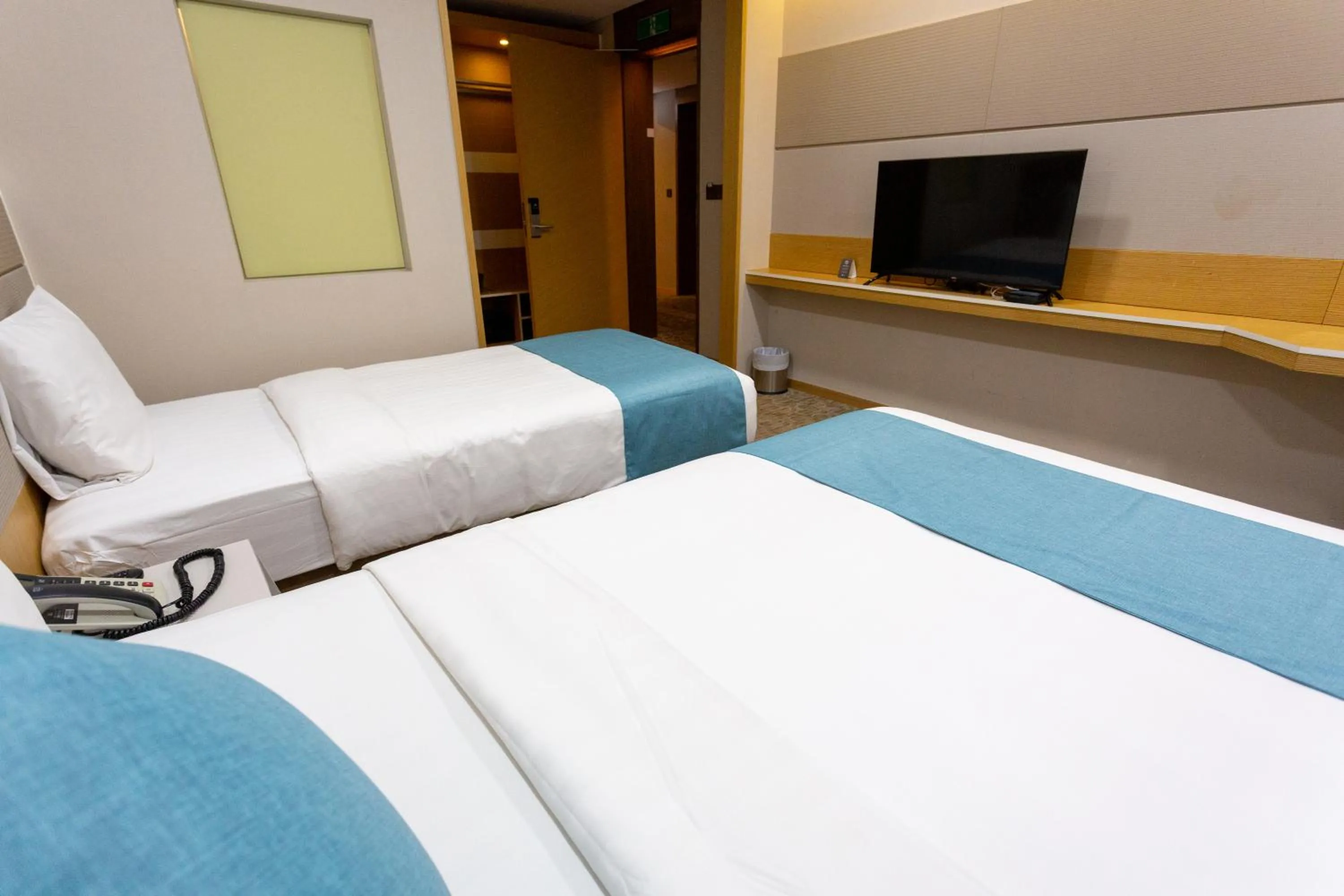 Bed in The Recenz Dongdaemun Hotel