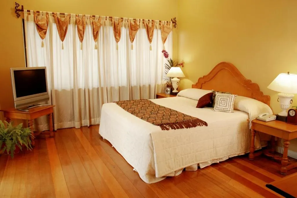 Bedroom, Bed in Sophia Suites Residence Hotel