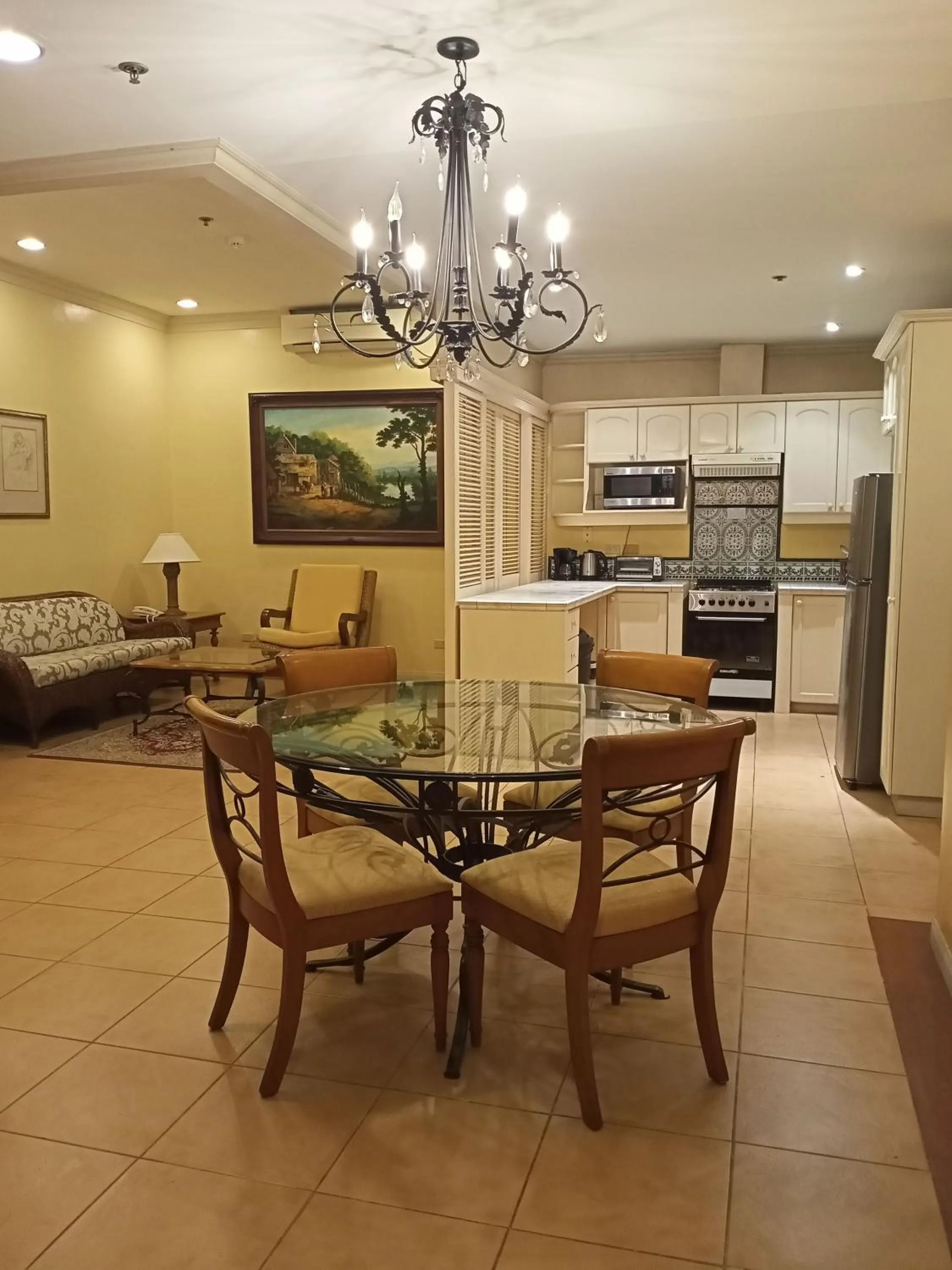 Kitchen or kitchenette in Sophia Suites Residence Hotel