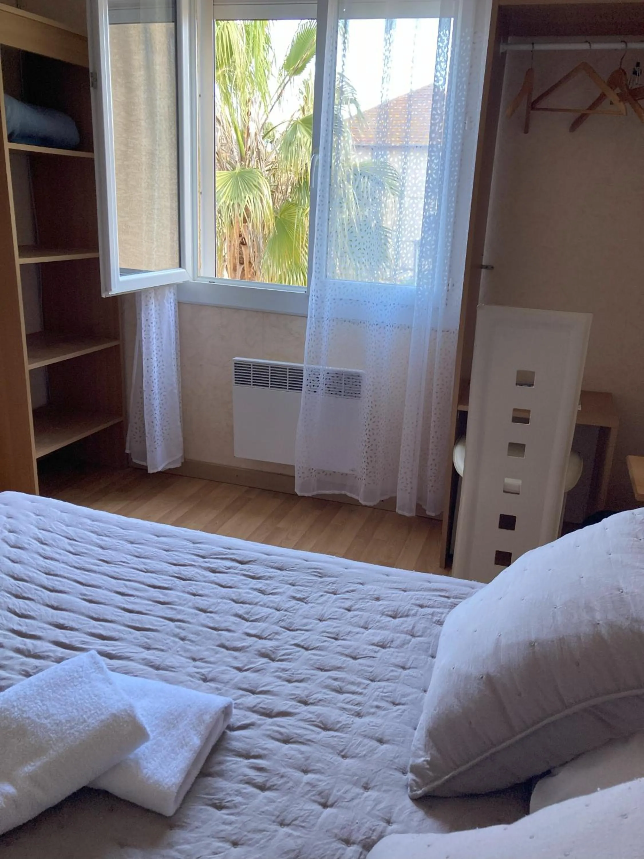 Photo of the whole room, Bed in Hôtel Le Gambetta