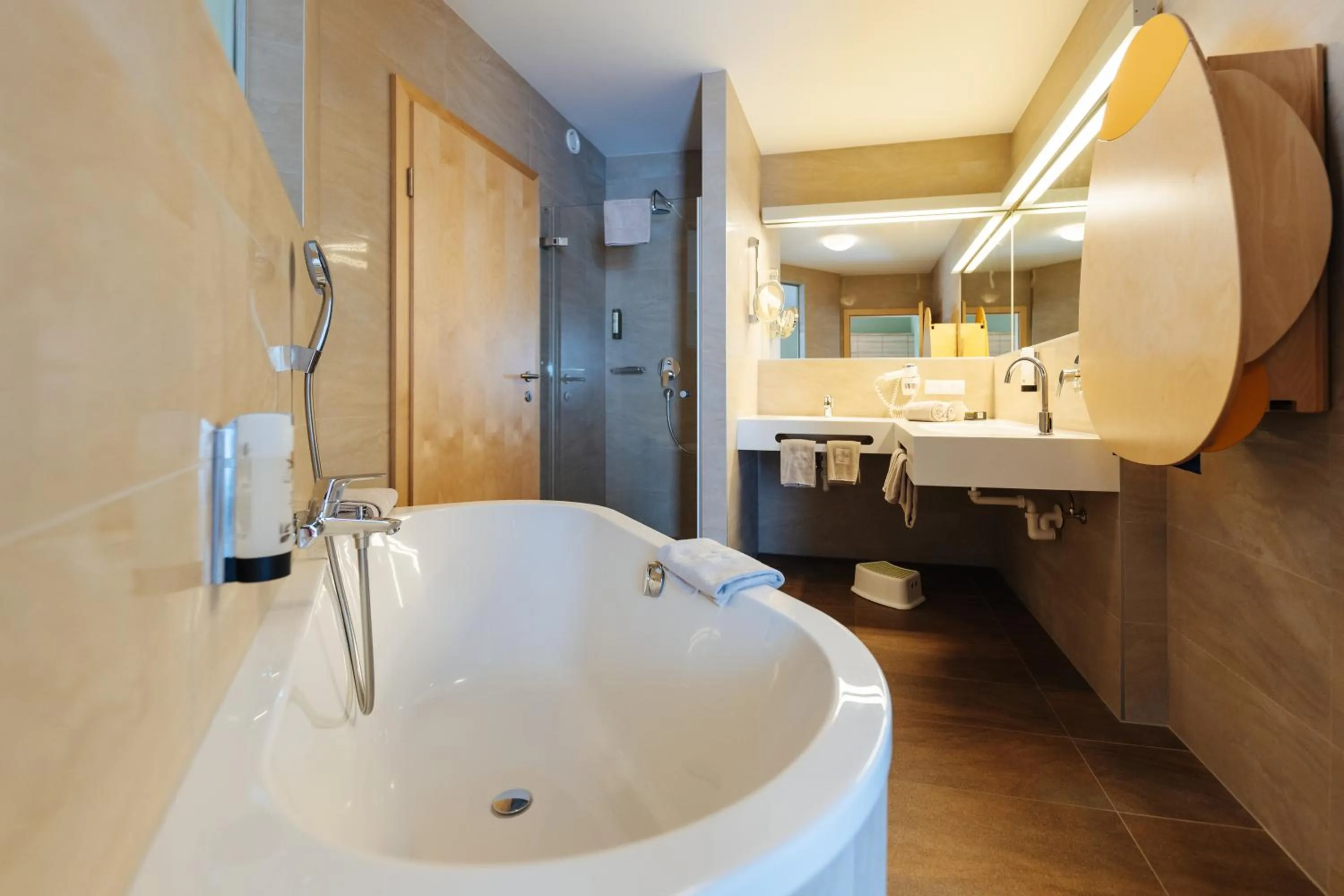 Bathroom in Familienhotel Trebesingerhof