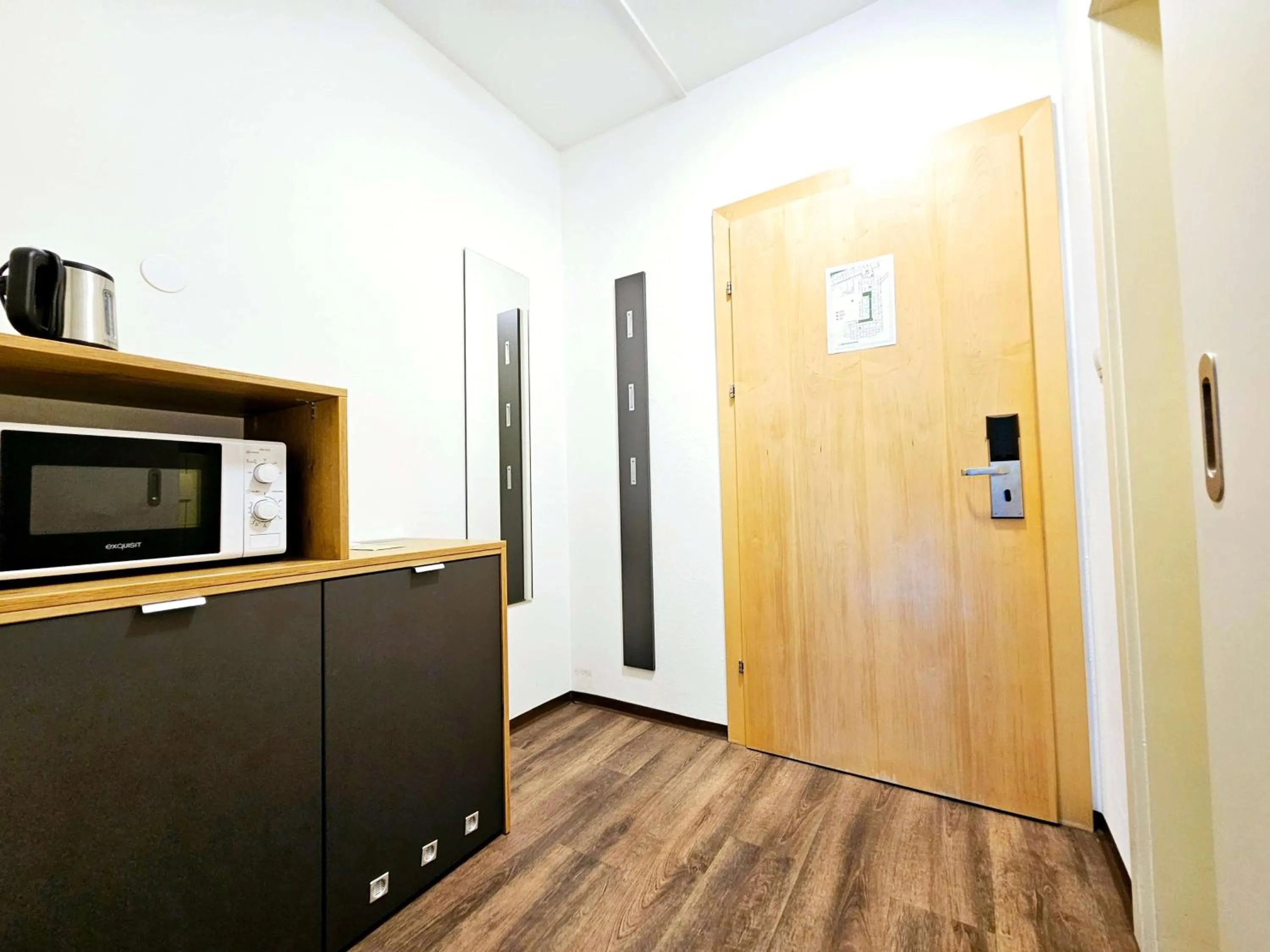 Kitchen or kitchenette in Familienhotel Trebesingerhof