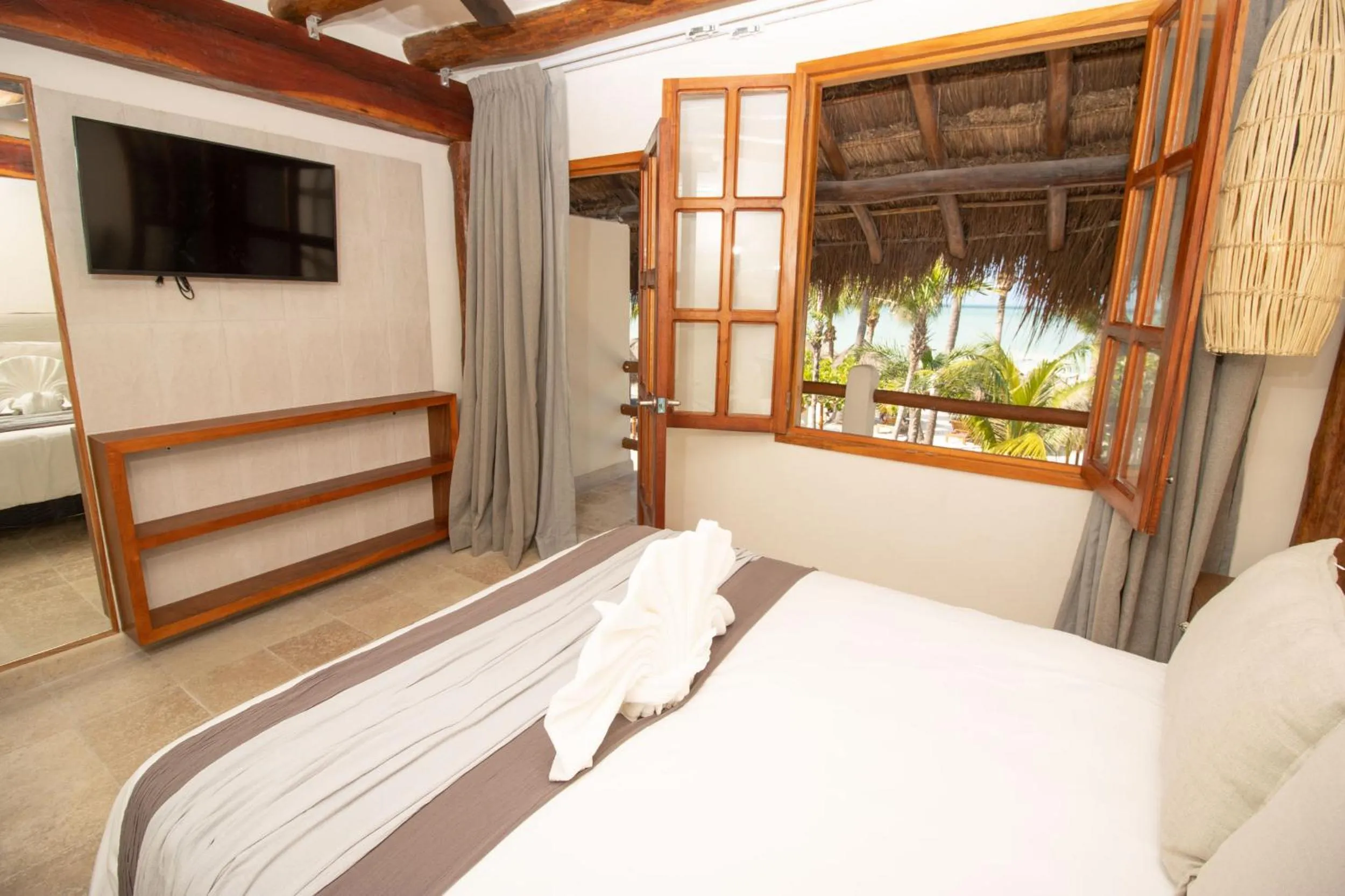 Bedroom, Bed in Amaite Holbox - Oceanfront Hotel