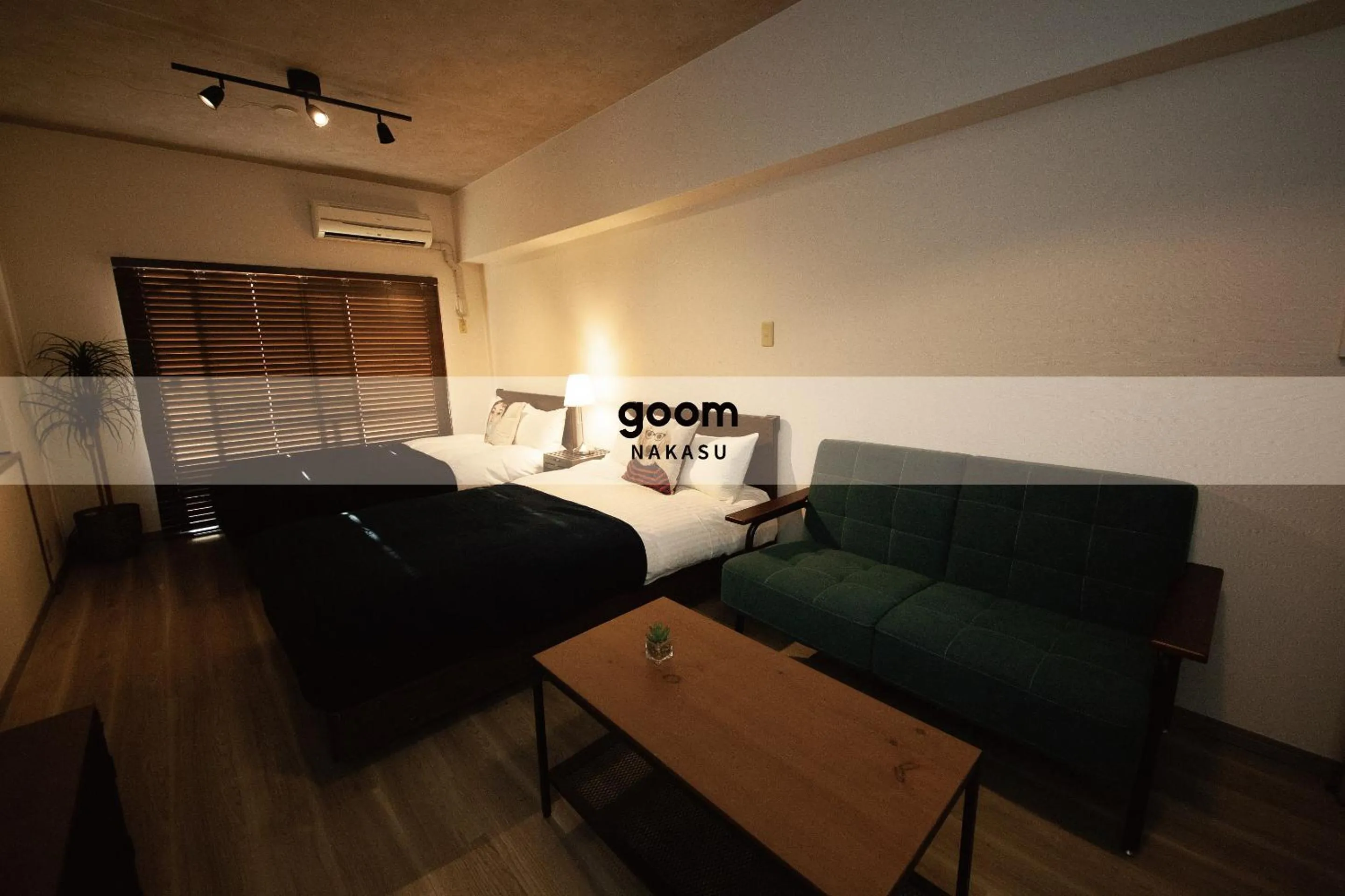 Text overlay, Bed in goom Hotel Nakasu