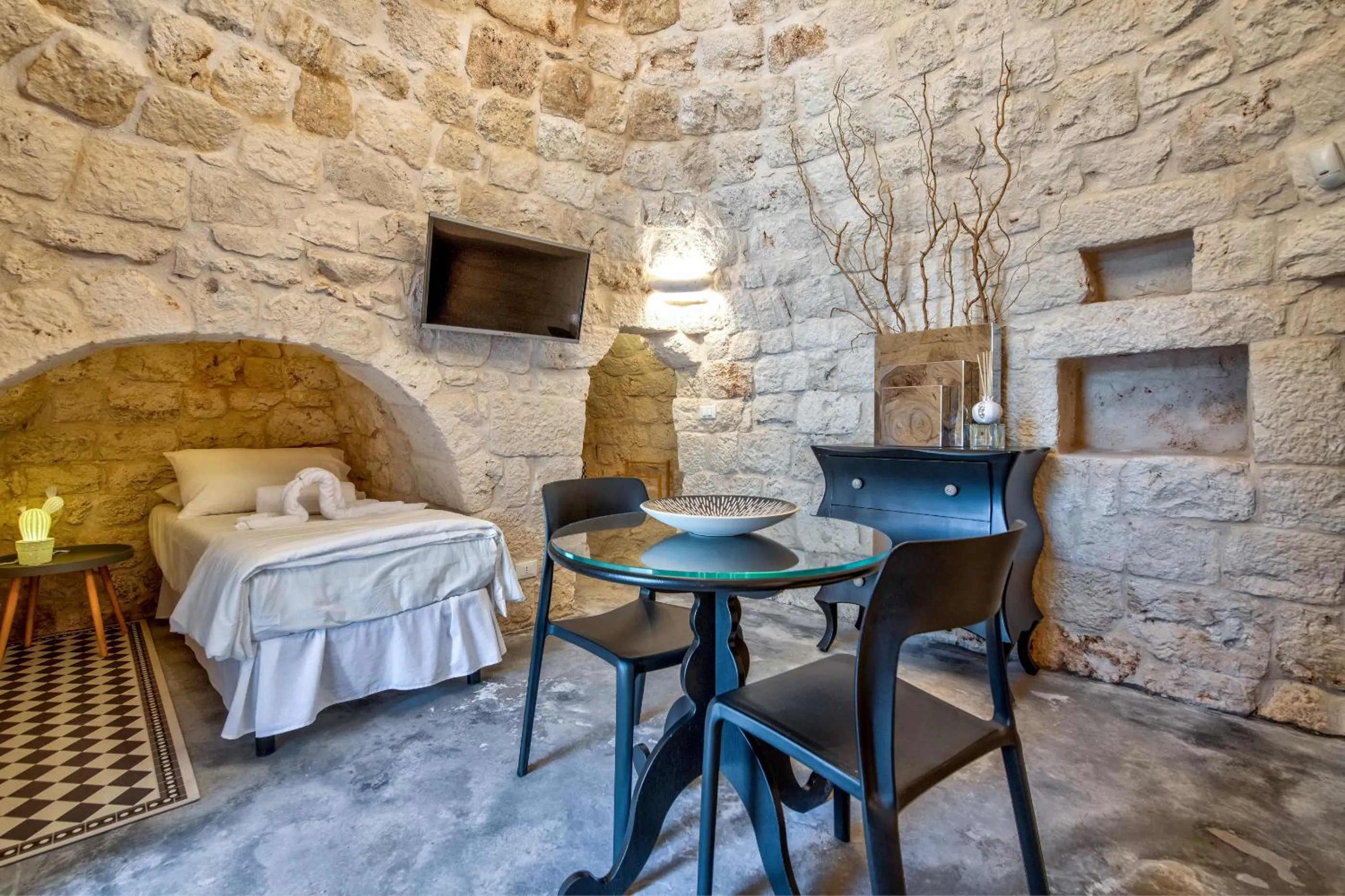 Living room, Bed in B&B Trulli Moonlight da Grace