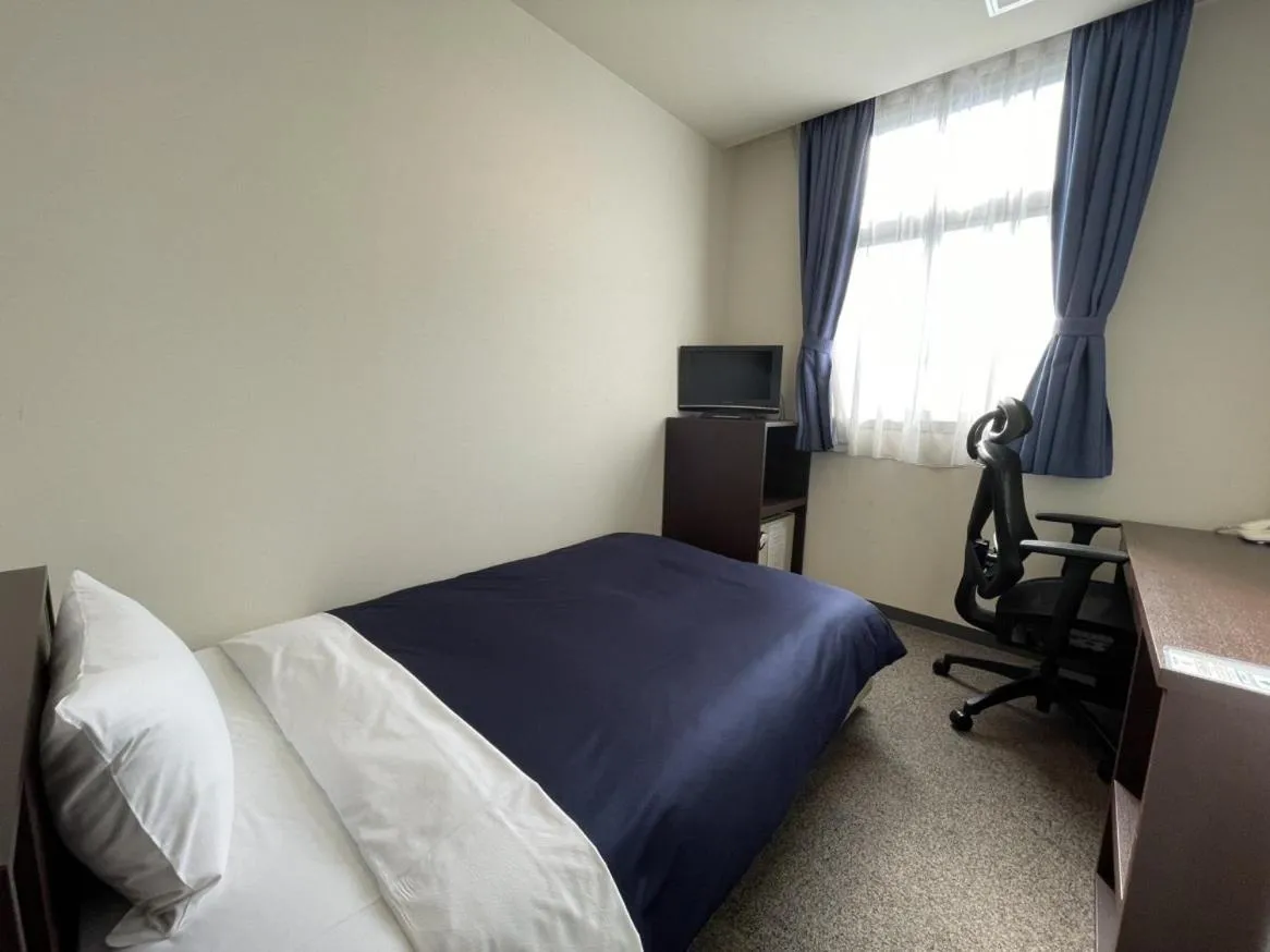 Photo of the whole room, Bed in Zentsuji Grand Hotel