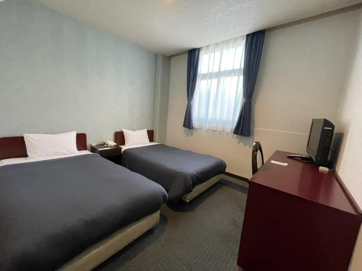 Photo of the whole room, Bed in Zentsuji Grand Hotel