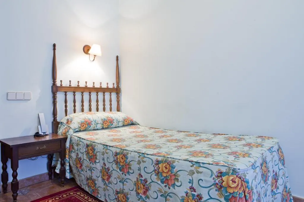 Bed in Hotel Rey Niño